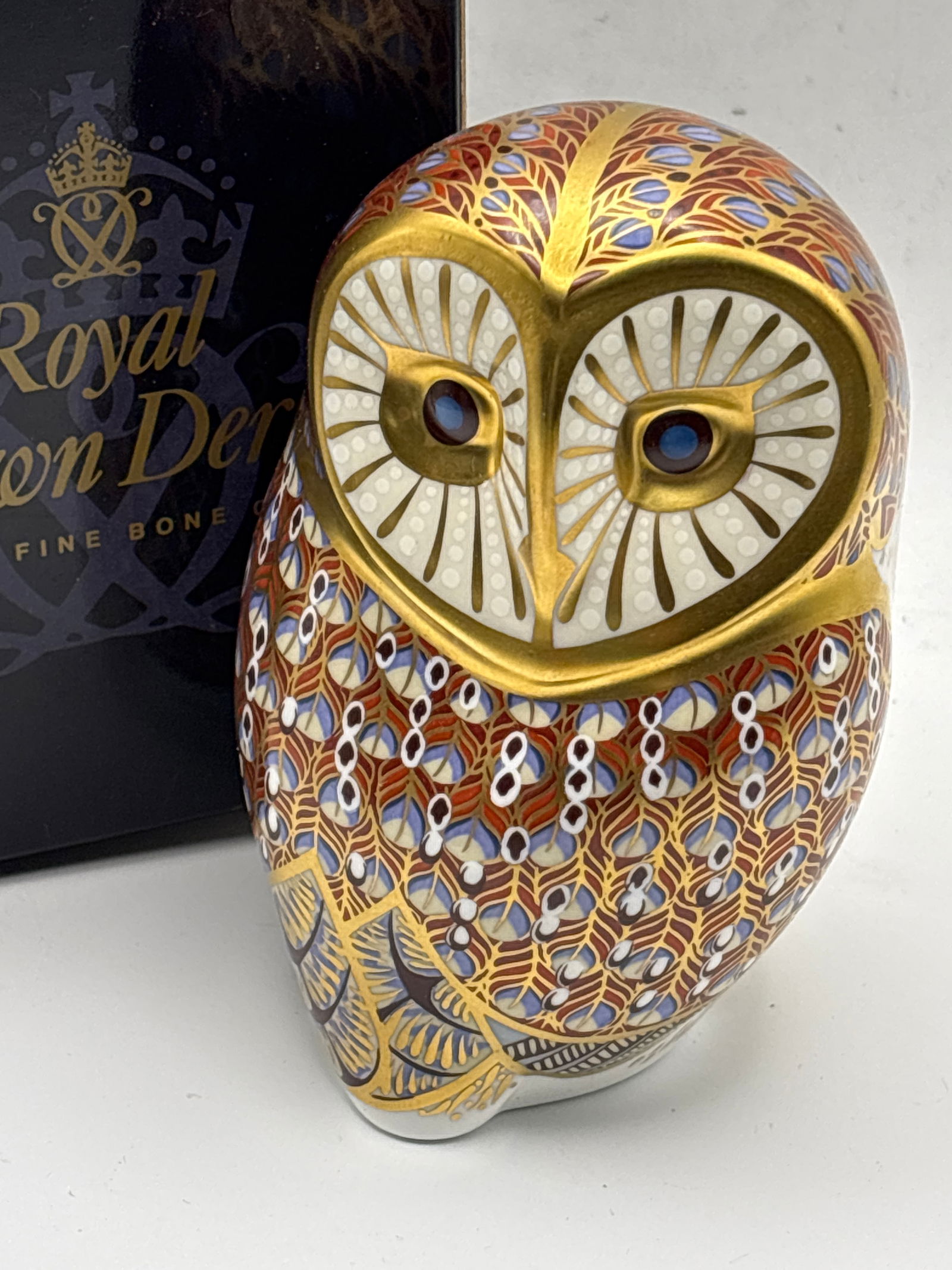 Royal Crown Derby Imari Barn Owl English fine china 5 inch Paperweight: Royal Crown Derby fine English Barn Owl Paperweight.It has silver stopper and comes in a box.It measures approximately 5 inches.