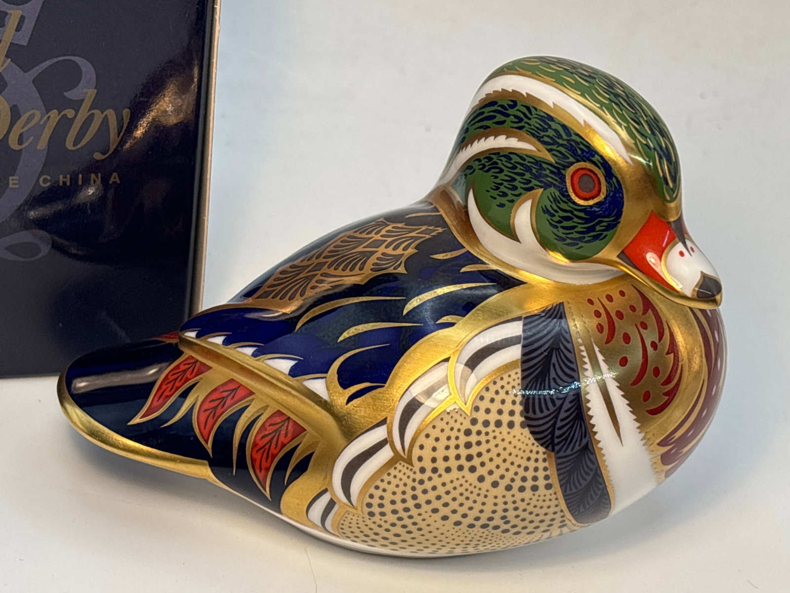 Gorgeous 2000 Carolina Duck Royal Crown Derby English fine China 4&1/2 inch paperweights: Carolina Duck Royal Crown Derby English fine China 4&1/2 inch paperweight. Gold stopper. With box.No chips, cracks, repairs…Very good condition