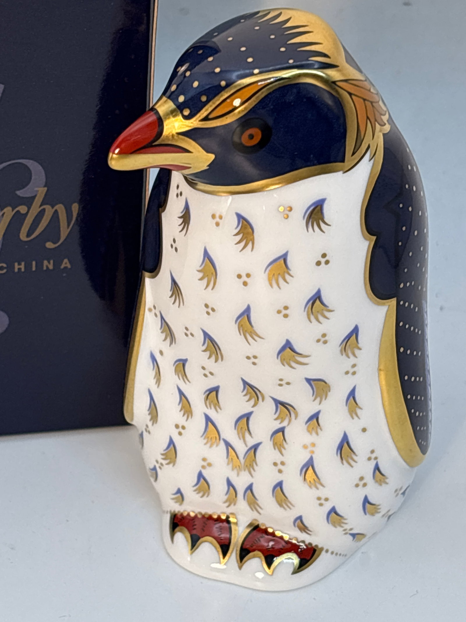 2001 John Ablitt design Rockhopper Penguin Royal Crown Derby 4inch paperweight: Rockhopper Penguin Royal Crown Derby 4inch paperweight . Gold stopper. With box.Very good condition with no chips, cracks, lines,etc