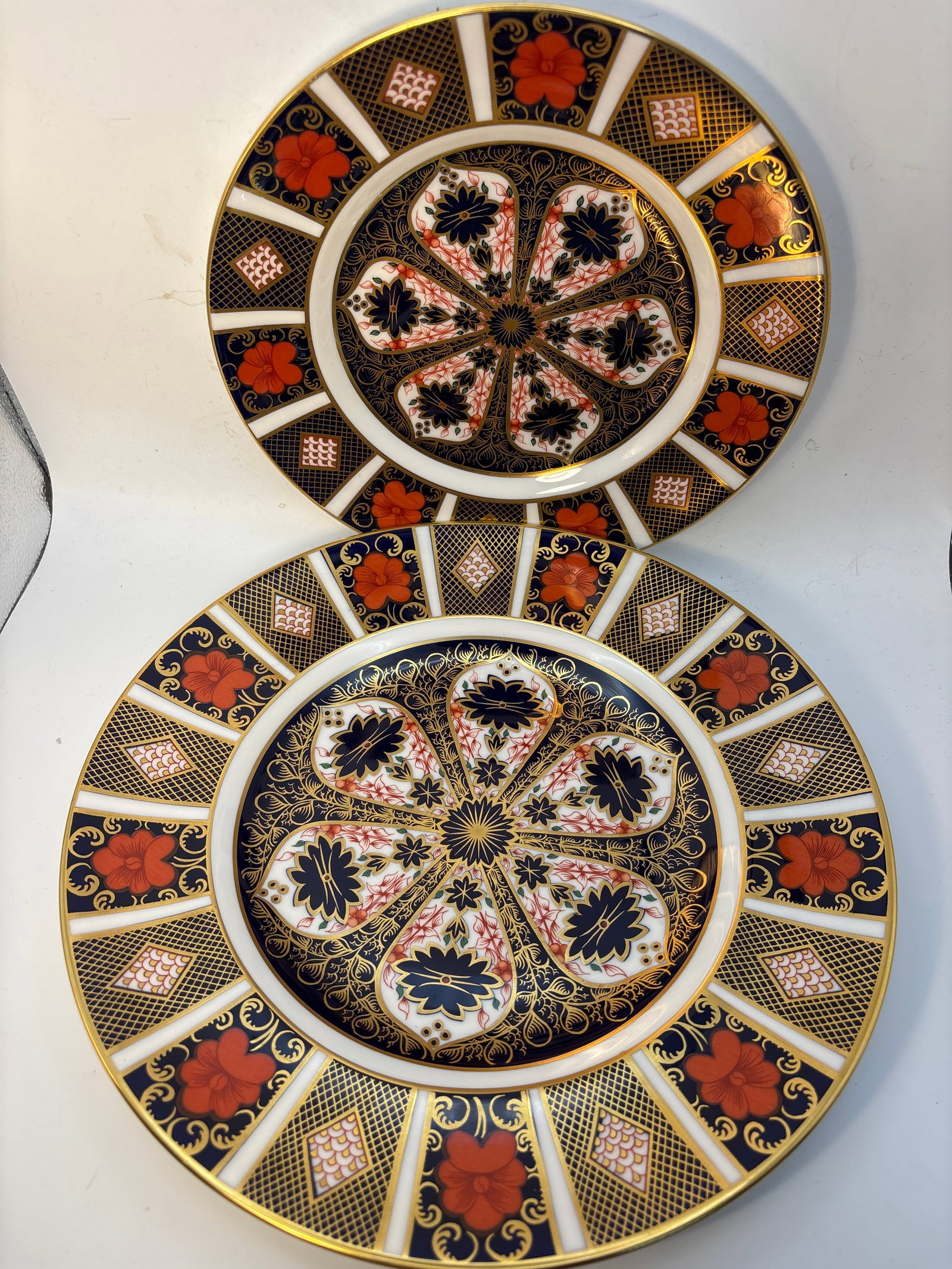 Two Royal Crown Derby Imari #1128 pattern plates; 10&1/4 and8&1/2inch: Two Royal Crown Derby Imari #1128 pattern plates.The 8&1/2 inch is first quality.The 10&1/4 is Seconds.Very good condition with no chips, cracks, lines,etc