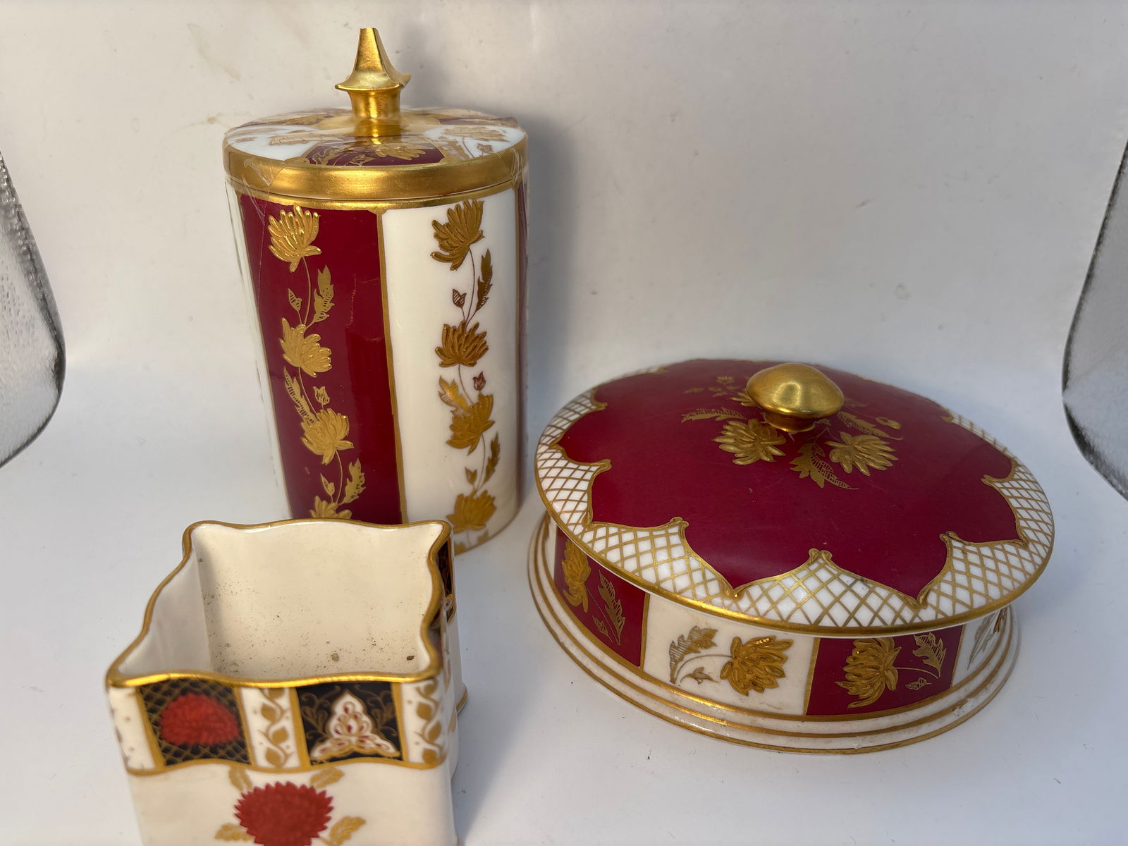 Three piece Abbeydale ‘Chrysanthemum’ English bone china covered bowl, jar &a small vase: Three piece Abbeydale ‘Chrysanthemum’ English bone china covered bowl, jar &a small vase. The covered bowl is 3” by 6”, covered jar is 6”(chip to tip) & vase/toothpick is 2&rdquo