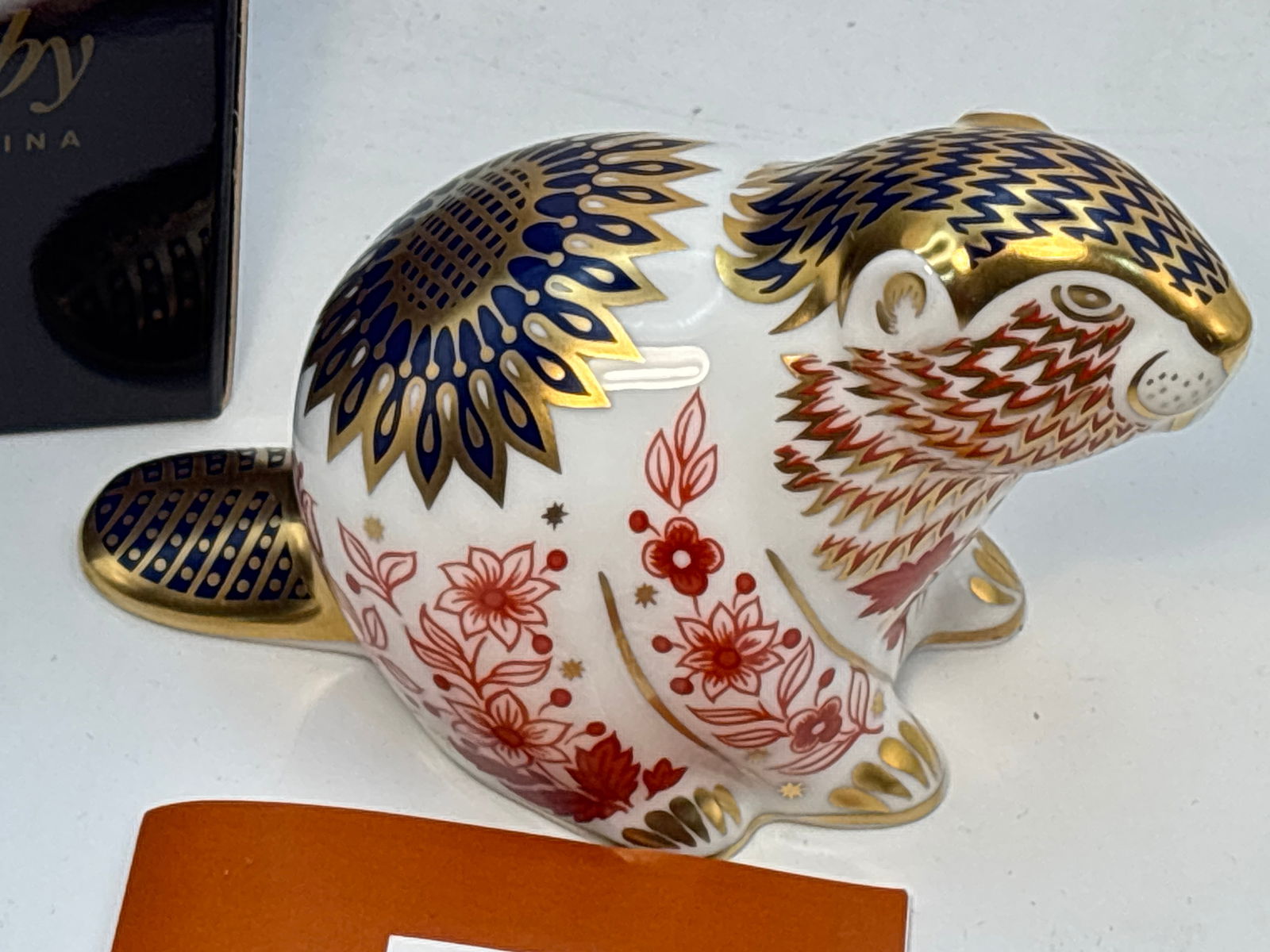 Imari ‘Beaver’ Royal Crown Derby English bone china 5 inch paperweight: Imari “Beaver”Royal Crown Derby English bone china 5 inch paperweight.Silver stopper. With Box.Very good condition; no chips, cracks, etc