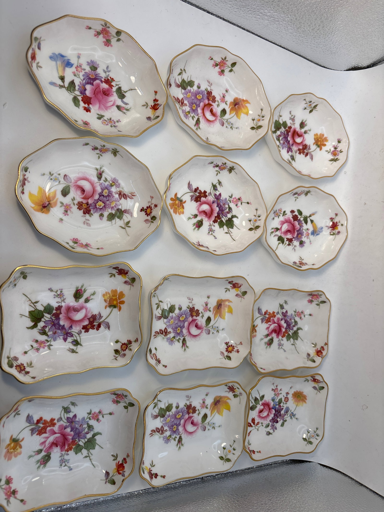 Two sets of six (12 total)Royal Crown Derby England fine china Posies 4 inch nut or candy dishes: Two sets of six (12 total)Royal Crown Derby England fine china Posies nut or candy dishes.Very good condition; no chips, cracks, etc