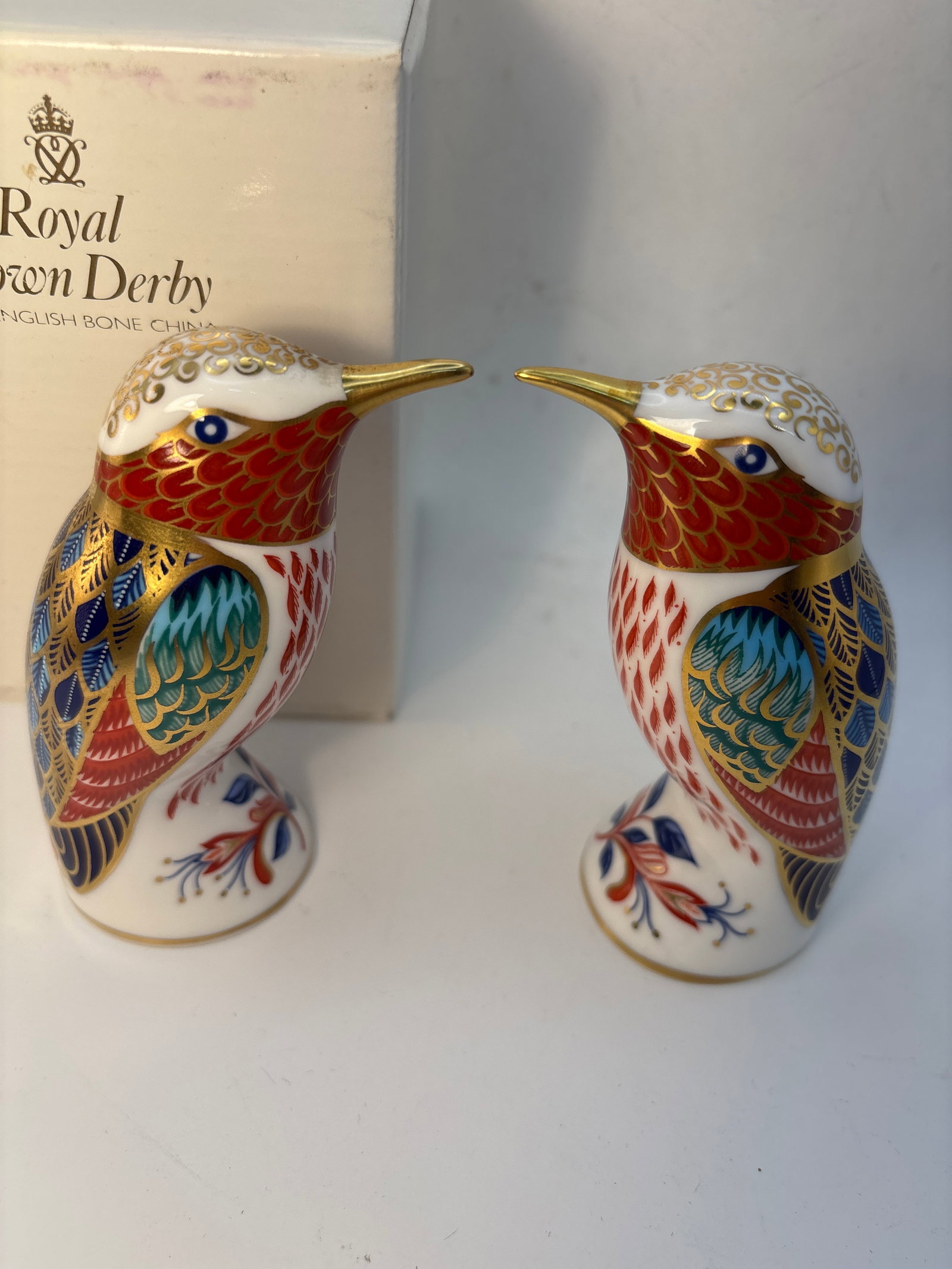 Two Hummingbirds Crown Derby Imari 4 inch paperweights: Two hummingbirds Royal Crown Derby 4 inch paperweights.Silver stoppers. One with box.(as is). Very good condition; no chips, cracks, etc