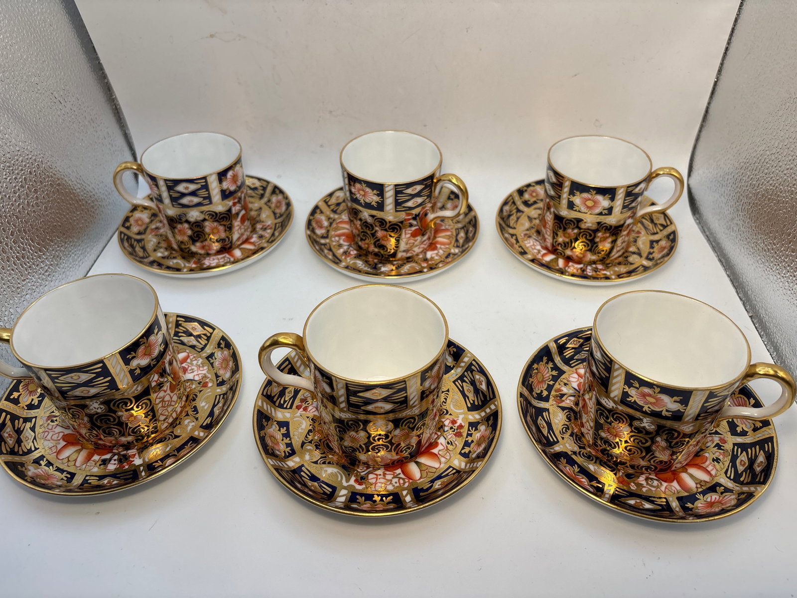 Set of six Imari #2451 pattern Royal Crown Derby demitasse cups w/saucers; 1st quality: Set of six Imari #2451 pattern Royal Crown Derby demitasse cups w/saucers; 1st quality. They are 2&1/4” by 2&1/4” and saucers are 4&1/2 inches.Beautiful condition.Very clean with no chips,