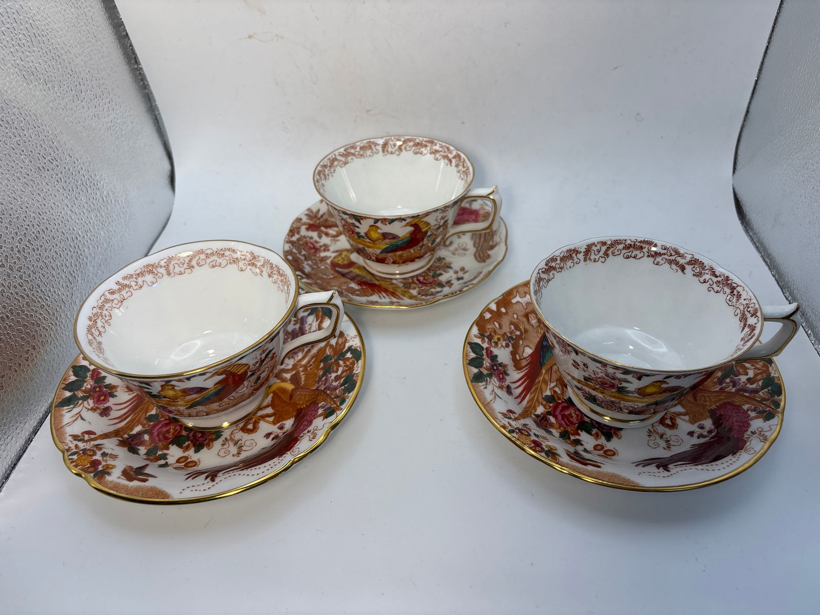 Three A73 pattern ‘Olde Avesbury’ Royal Crown Derby fine china tea cups w/saucers;2 1stquality: Three similar A73 pattern ‘Olde Avesbury’ Royal Crown Derby fine china. Cups are 2&12 high by 3&3/4 across top & 5&3/4 inch saucer plates . Two are first quality.No marks, etc.Very Good condition.