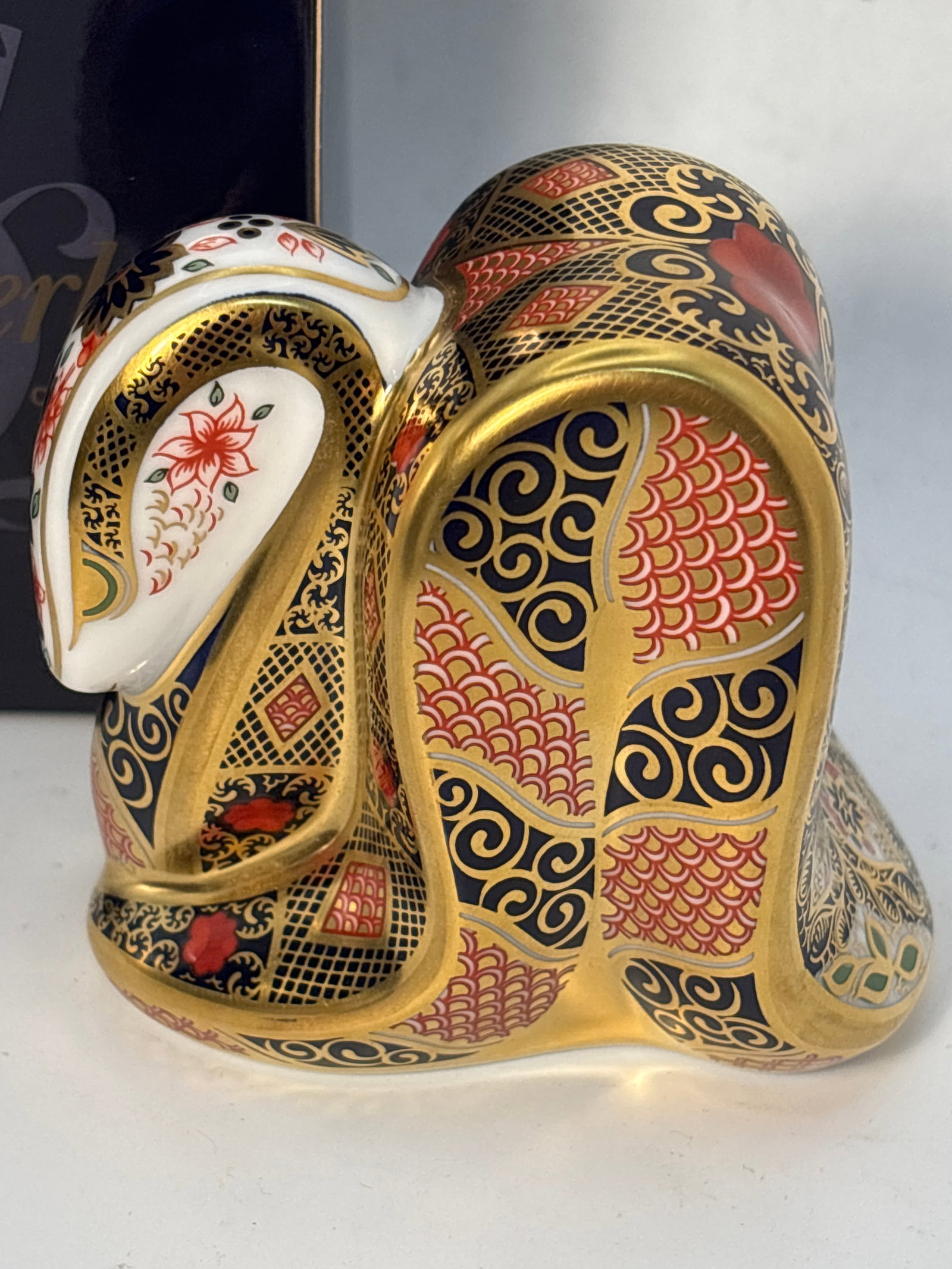 Awesome Imari Snake Royal Crown Derby fine china 3&1/2 inch paperweight: Awesome Imari Snake Royal Crown Derby fine china 3&1/2 inch paperweight .Gold stopper. With box.Like new beautiful condition