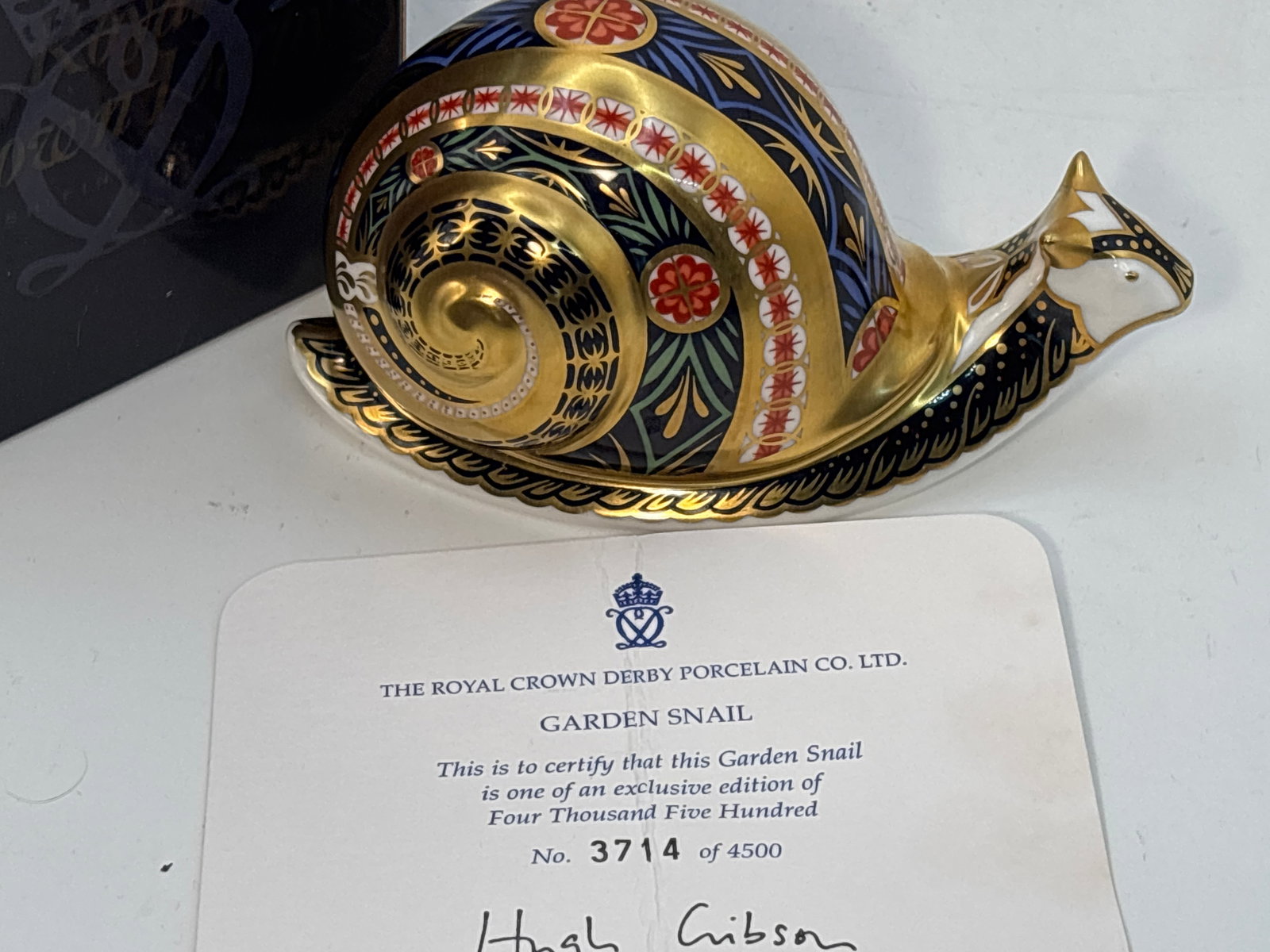 Magnificent 1999 limited edition Garden Snail Royal Crown Derby fine china 5 inch paperweight: 1999 limited edition Royal Crown Derby fine china 5inch paperweight .Gold stopper. With box.Like new beautiful condition