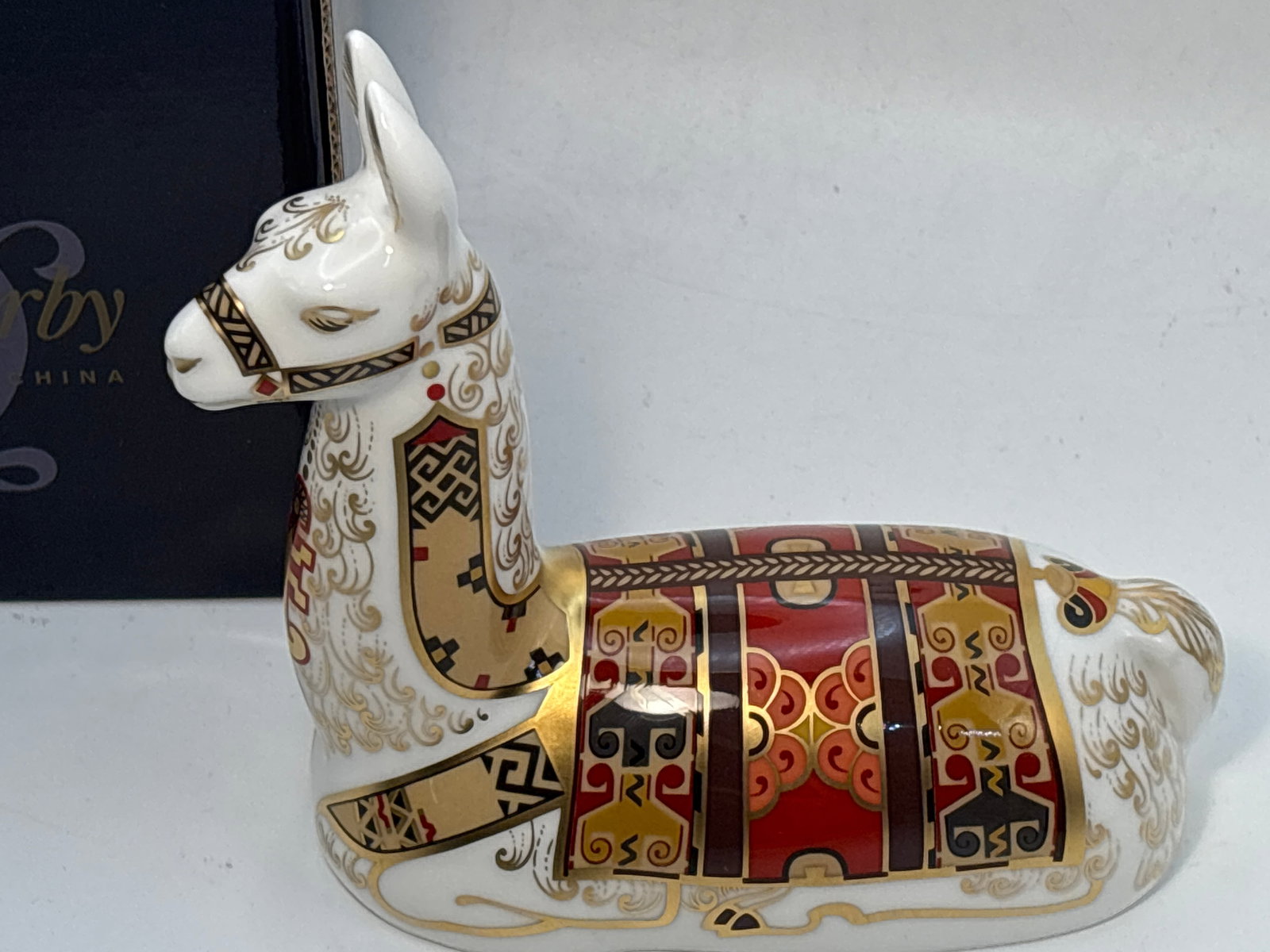 2000 Collectors Guild ‘Llama’ Royal Crown Derby fine china 5&1/4 inch paperweight: 2000 Collectors Guild ‘Llama’ Royal Crown Derby fine china paperweight.Gold stopper. With box. beautiful condition. No chips, cracks, etc.