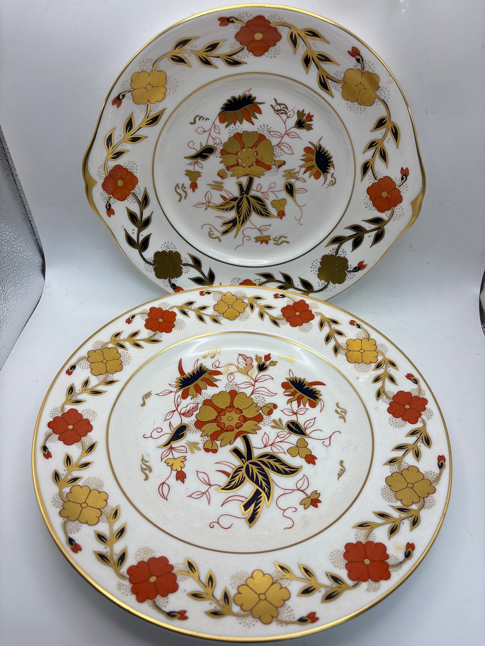 Asian Rose pattern Royal Crown Derby dessert plate & 10&1/2 inch plate: Asian Rose pattern Royal Crown Derby dessert plate & 10&1/2 inch plate.Good condition with no chips, cracks, etc.