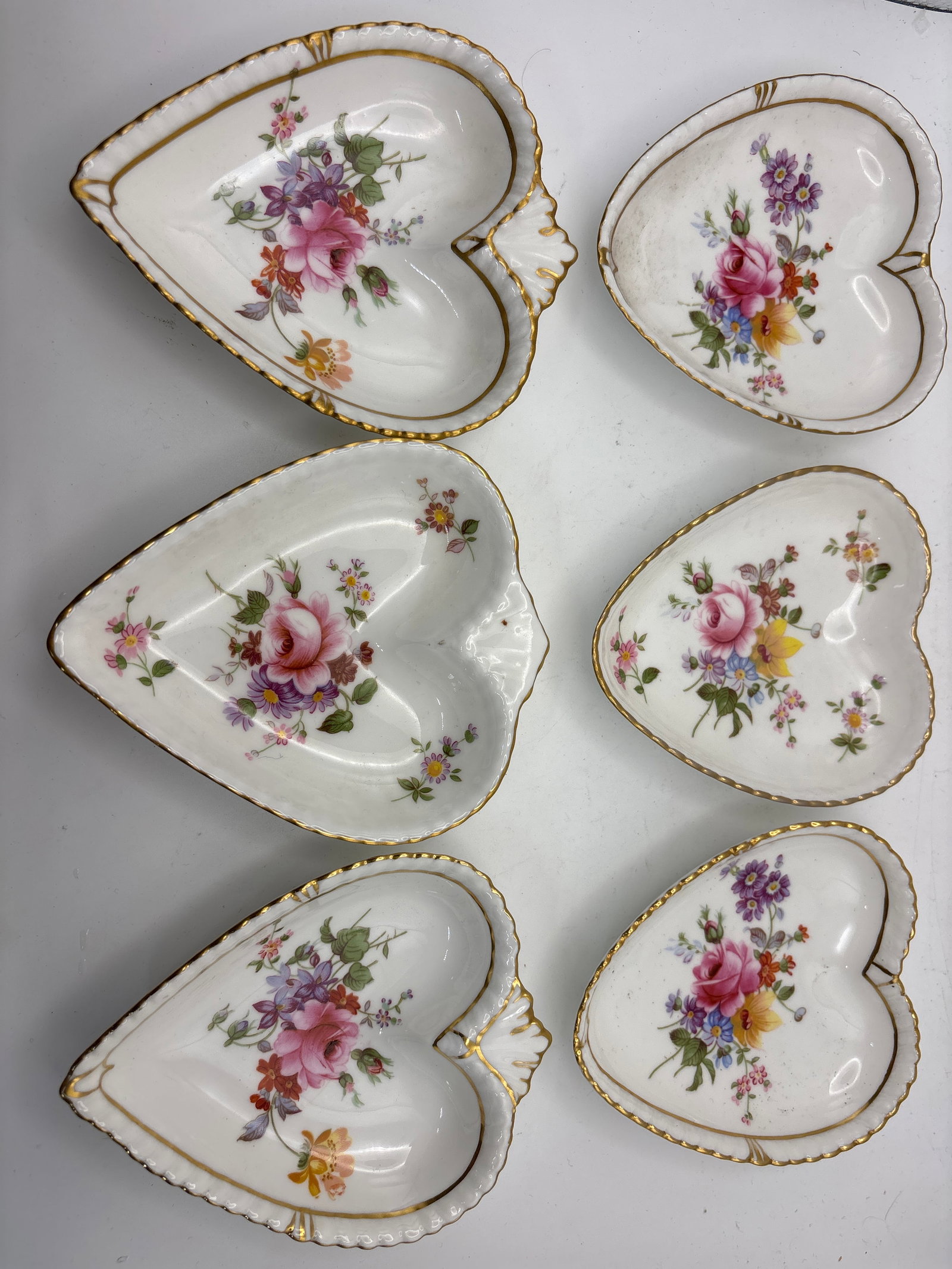 Six assorted heart shaped Derby Posies Royal Crown Derby 3&1/2 inch small dishes: Six assorted heart shaped Derby Posies Royal Crown Derby 3&1/2 inch dishes.Very Good condition