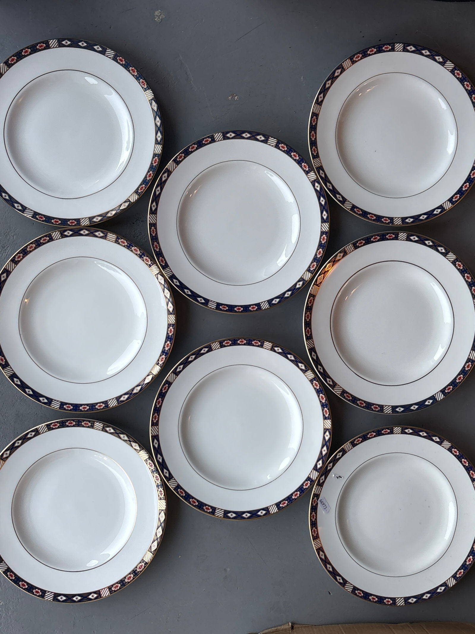 Set of eight Kedleston pattern Royal Crown Derby 10&1/2 inch dinner plates: Set of eight Kedleston pattern Royal Crown Derby 10&1/2 inch dinner plates. White glazed with Cobalt blue band with diamonds, gold & rust detailing.Possibly seconds.Very good with no issues