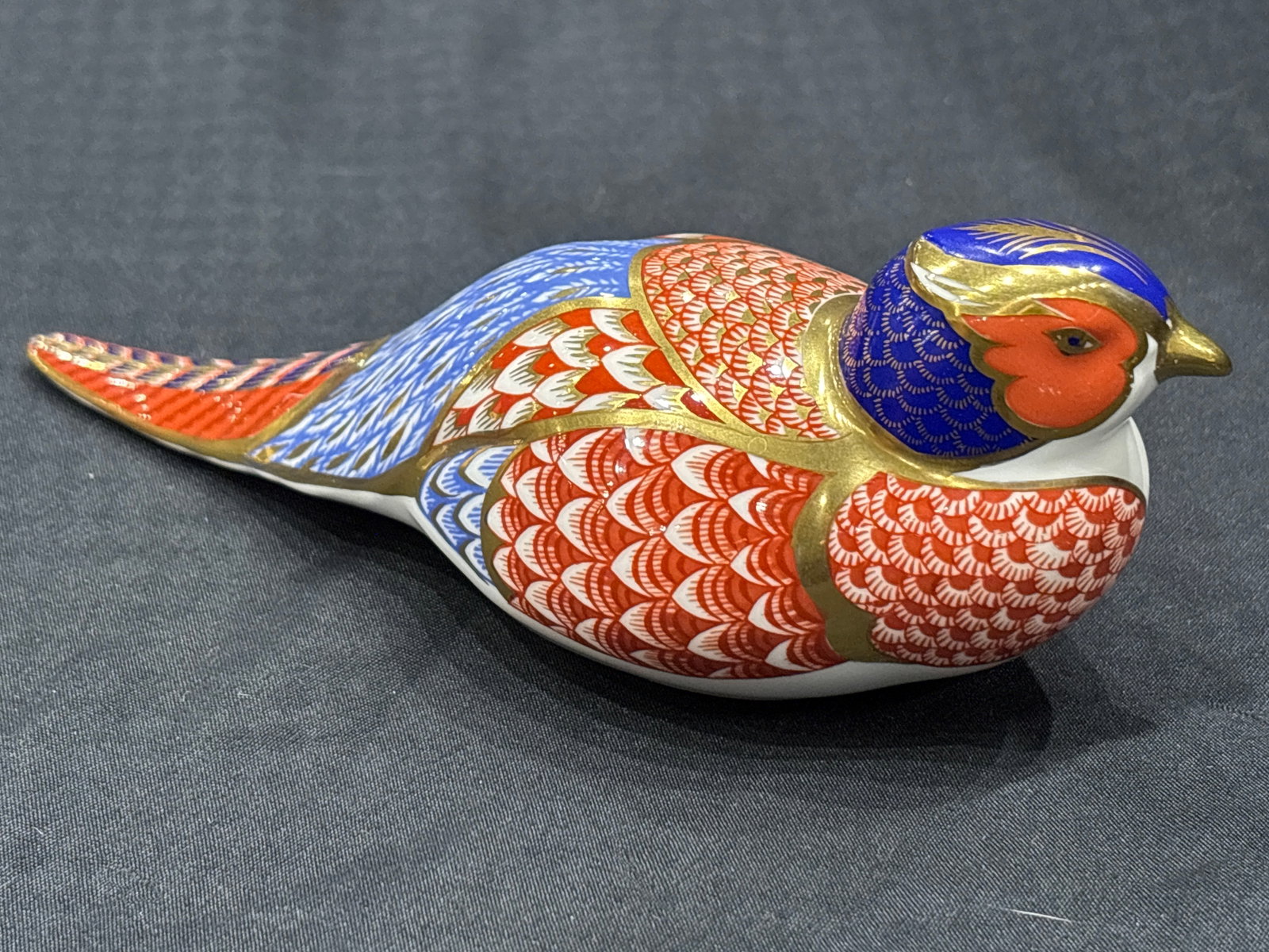 Imari Pheasant form Royal Crown Derby 6&1/2 inch paperweight: Pheasant Royal Crown Derby 6&1/2 inch paperweight. Silver stopper but no box.Very good condition with no chips, cracks, etc