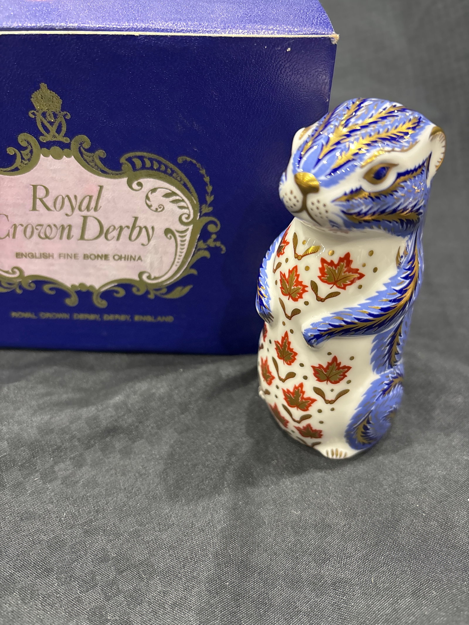Blue Chipmunk Royal Crown Derby 4inch paperweight: Blue glazed chipmunk Royal Crown Derby 4 inch paperweight .In original box. Gold stopper.Like new