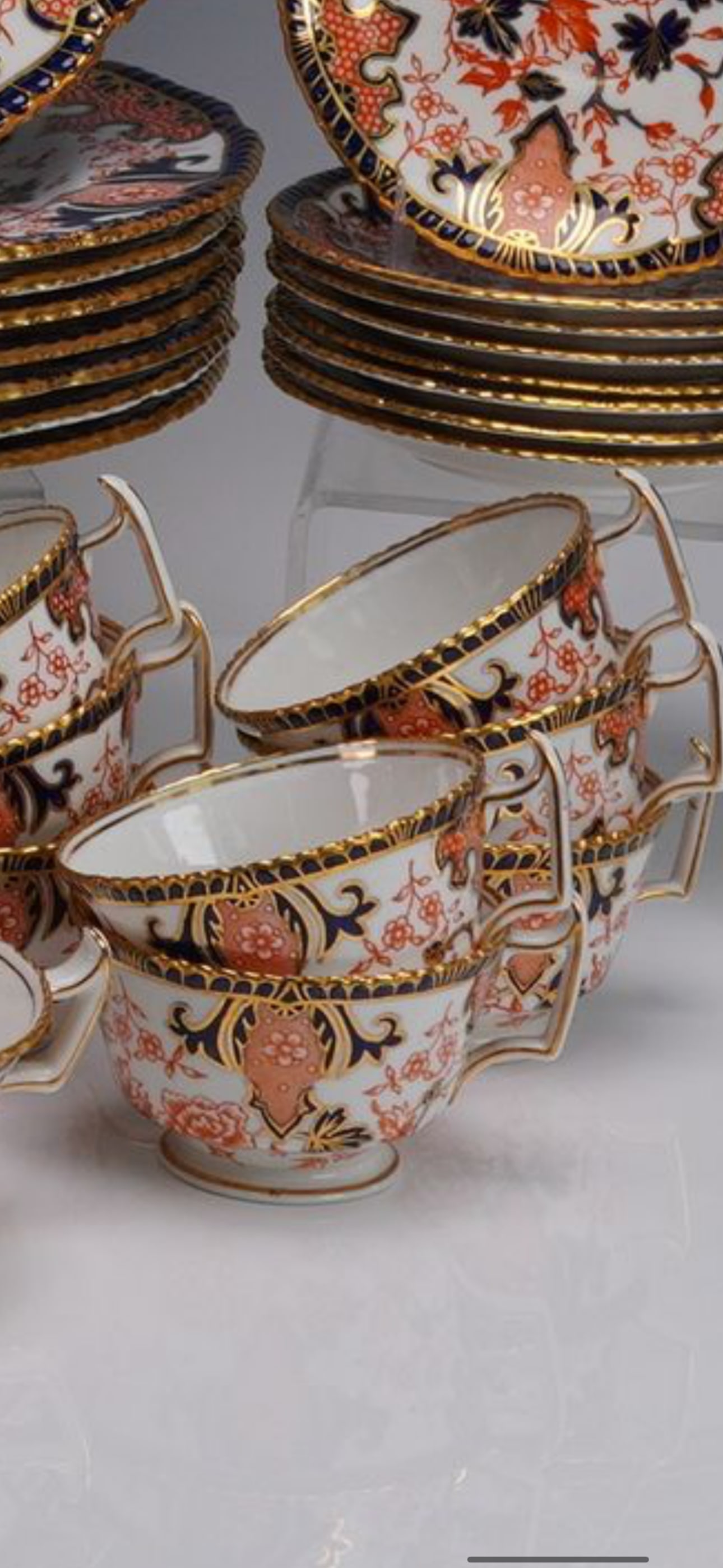 Set of eight Black Starr & Gorham Imari 2224Royal Crown Derby tea cups with saucers: Antique Royal Crown Derby porcelain tea cups sets in the Imari pattern number 2224, retailed by Black Starr & Gorham, New York. Each tea cup measures 4"L x 2.25"H.& saucers measures 0.75"H x 5.75"dia.