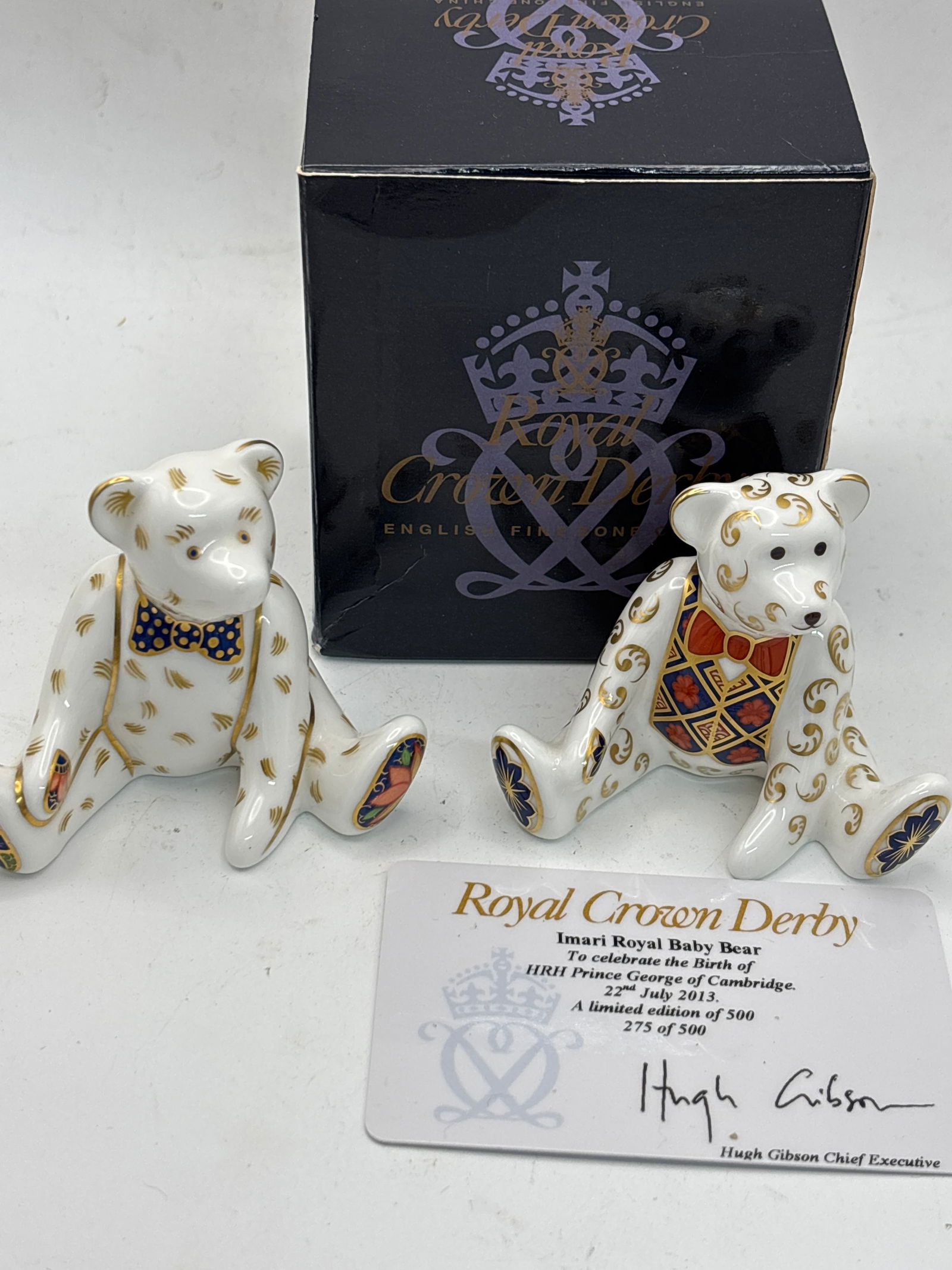 Two Royal Baby Bear ‘Prince George & Edward Royal Crown Derby England paperweights: Two Royal Baby Bear ‘Prince George & Edward Royal Crown Derby England paperweights. The one with box and COA is to celebrate the birth of Prince George and the other is Edward or shopping bear. 2&1/