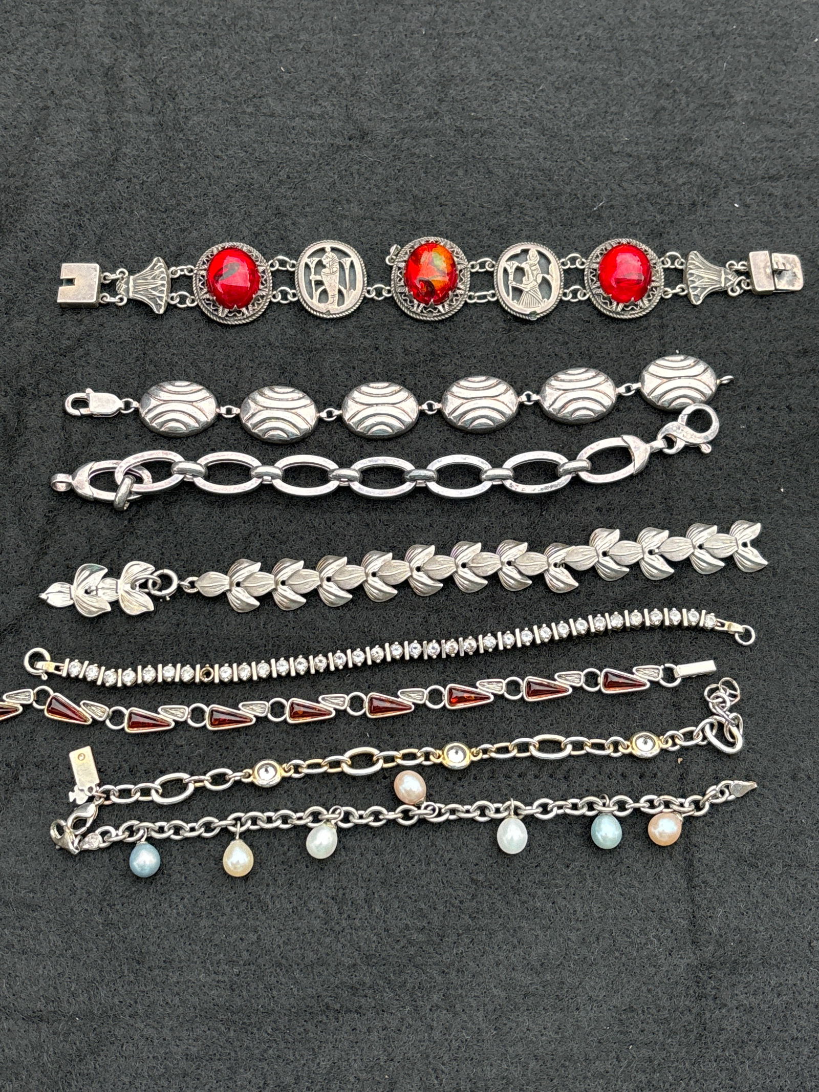 Group of eight assorted silver large bracelets; about 130grams (1 of 6)
