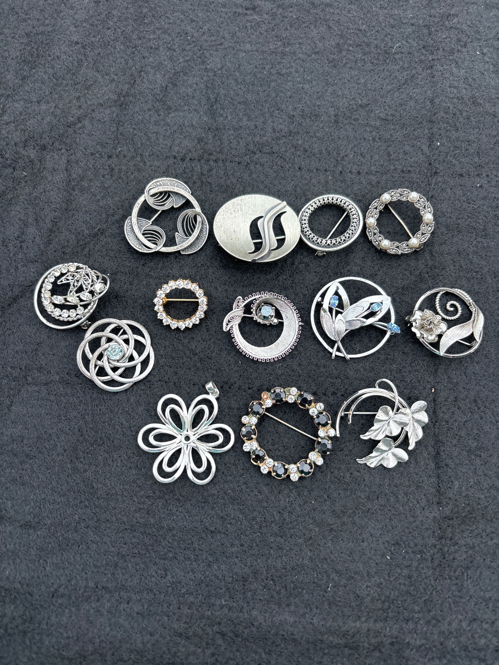 Group of thirteen assorted Sterling silver brooch/pins; about 70 grams (1 of 7)