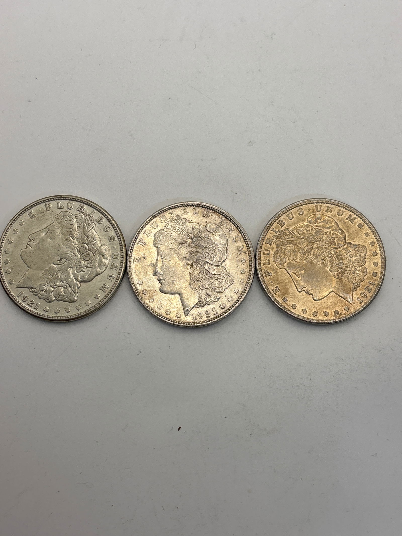 Three nice 1921 American Morgan silver dollars dated 1921 (1 of 5)