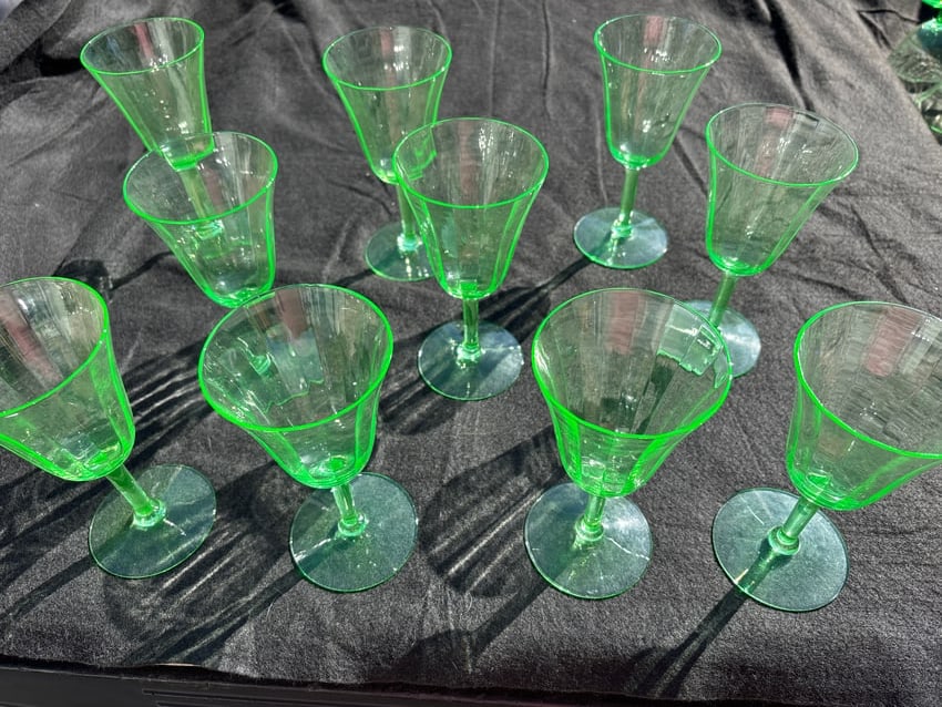 Set of 10 antique depression era Vaseline/uranium 7 inch glasses,1chip: Set of 10 antique depression era Vaseline/uranium 7 inch glasses. Vertical subtle line design. A little over 3&1:4 at top and 3 inches at bottom.All very good with only one rim chip.