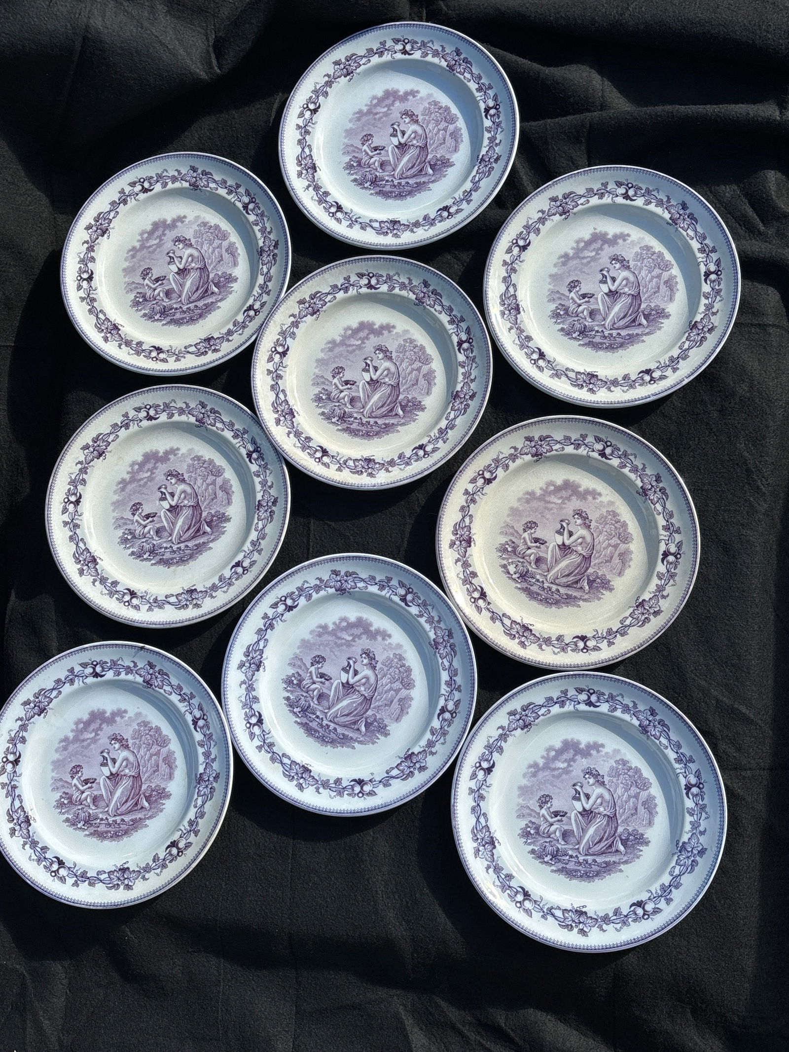 Rare 19th C. Set of nine H.K. Browne (Phiz) English ironstone pottery mulberry 10&1/4 in plates: Rare 19th C. Set of nine H.K. Browne (Phiz) English ironstone pottery mulberry dinner plates. I’ll have Mulberry lavender purple color with classical scene of semi nude with child. No chips or brake