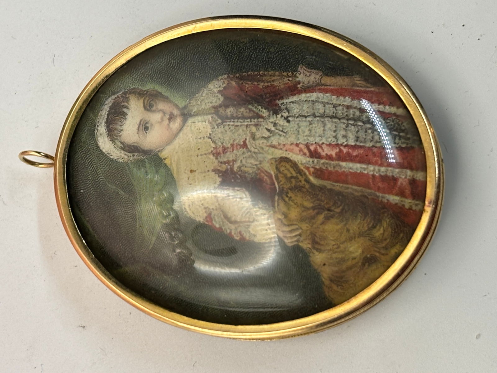 Antique 14 k gold framed large pendant locket; 29 grams: Antique 14 k gold framed large 2&1/4 inch pendant locket. It is not marked 14 k but tests at 14 k gold. It is 29 grams total weight.