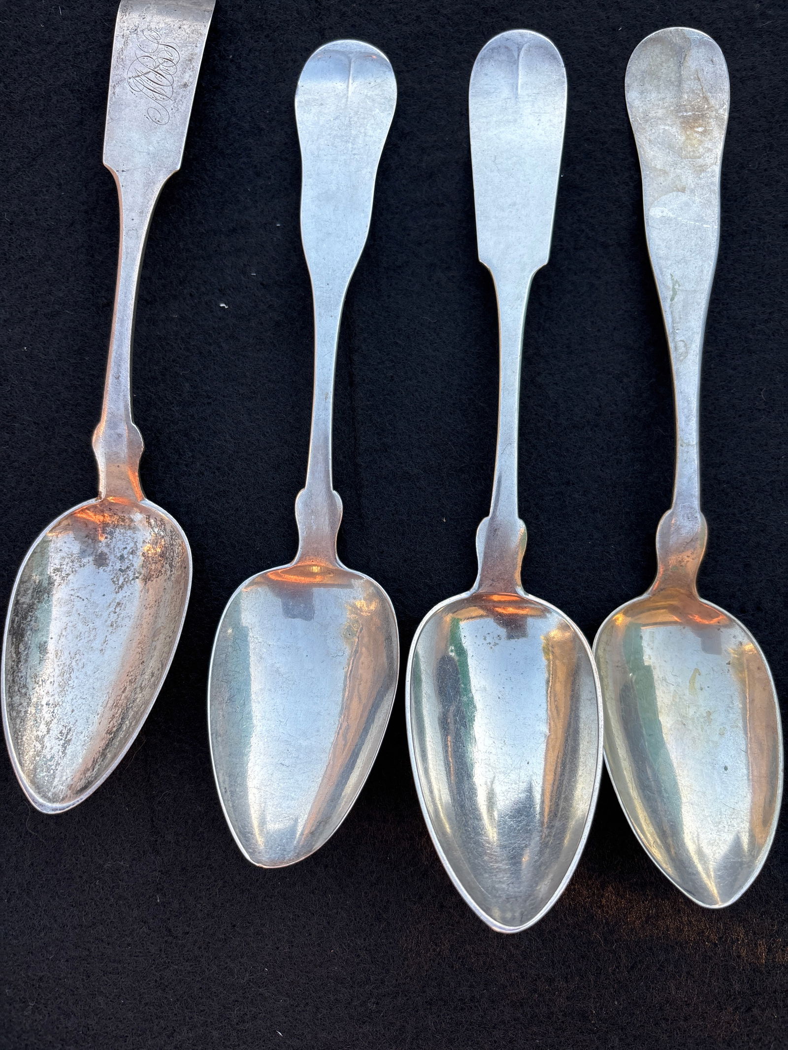 Four similar 19th C. American coin silver 8&3/4inch serving spoons; 196grams (1 of 7)