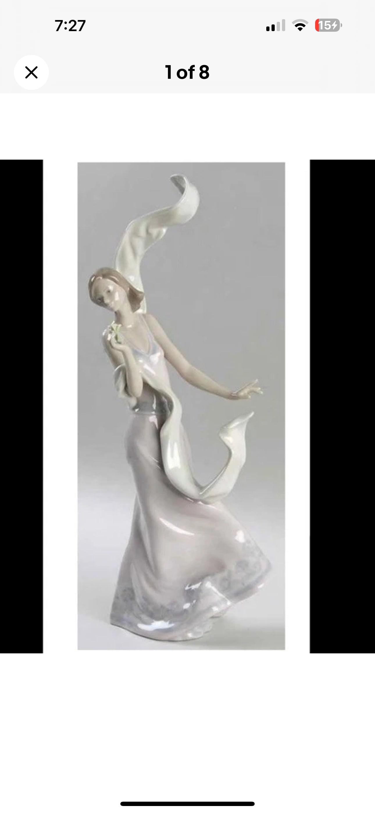 Tall 13&3/4 inch Lladró porcelain figurine titled "Wind of Peace" (model number 6251): Lladró porcelain figurine titled "Wind of Peace" (model number 6251). Lladro label on bottom. Lovely lady sculpture.No box.No chips, cracks, repairs, etc.