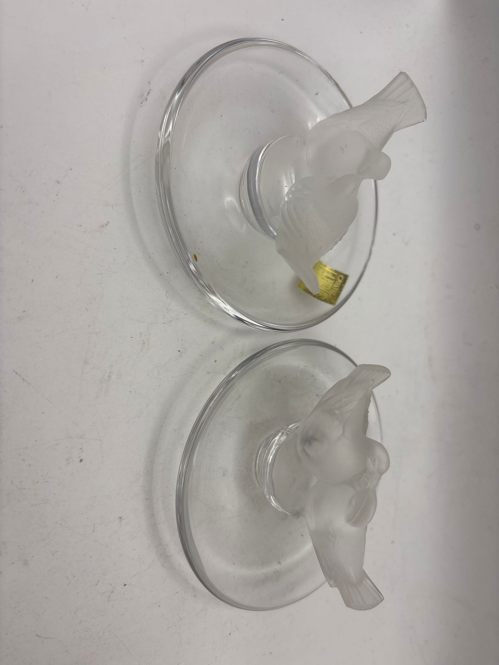 Two LALIQUE French crystal ‘Colombes’ lovebirds 3&1//2 inch ring holders: Two LALIQUE French crystal ‘Colombes’ lovebirds 3&1//2 inch ring holders. No box.signed Lalique. No chips, cracks, repairs, etc.