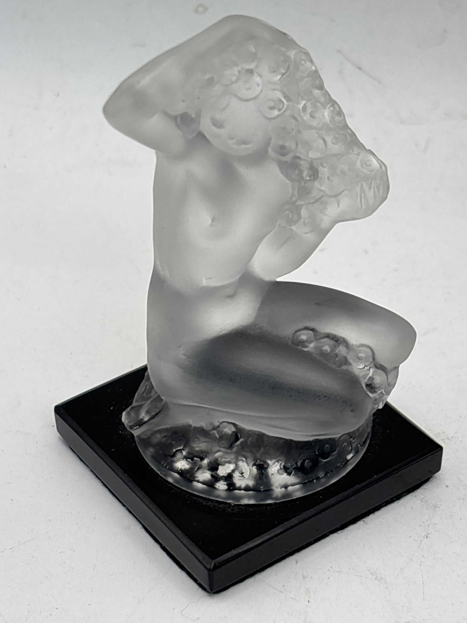 Original signed Lalique French crystal ‘Flora’ 3&1/2 inch statue on black glass base: Original signed Lalique French crystal ‘Flora’ statue on black glass base. Signed on base edge. Good condition
