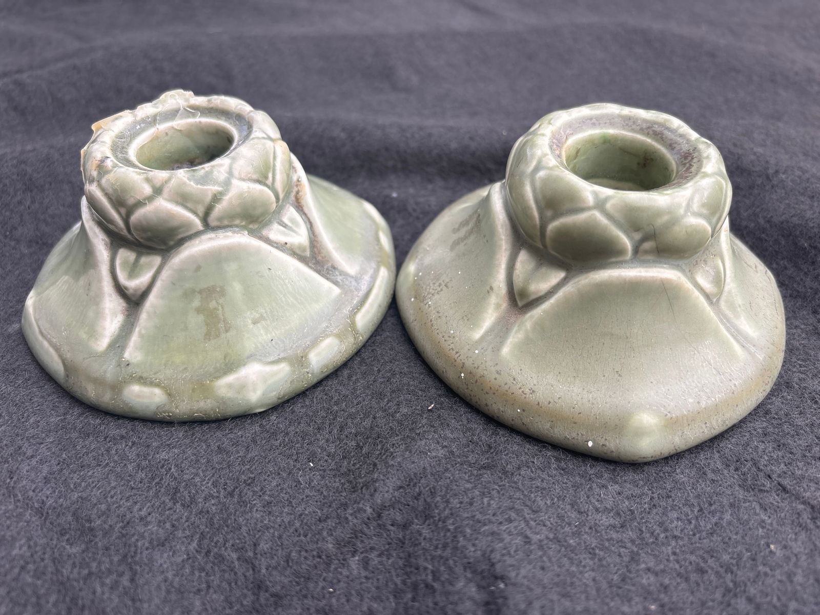 Art Deco Rookwood 1923 green art pottery 2x4 inch candle holders #2635: Art Deco Rookwood 1923 art pottery 2x4 inch candle holders #2635, glazed pottery with subtle relief design. Good condition, no chips, cracks, etc. no repairs.