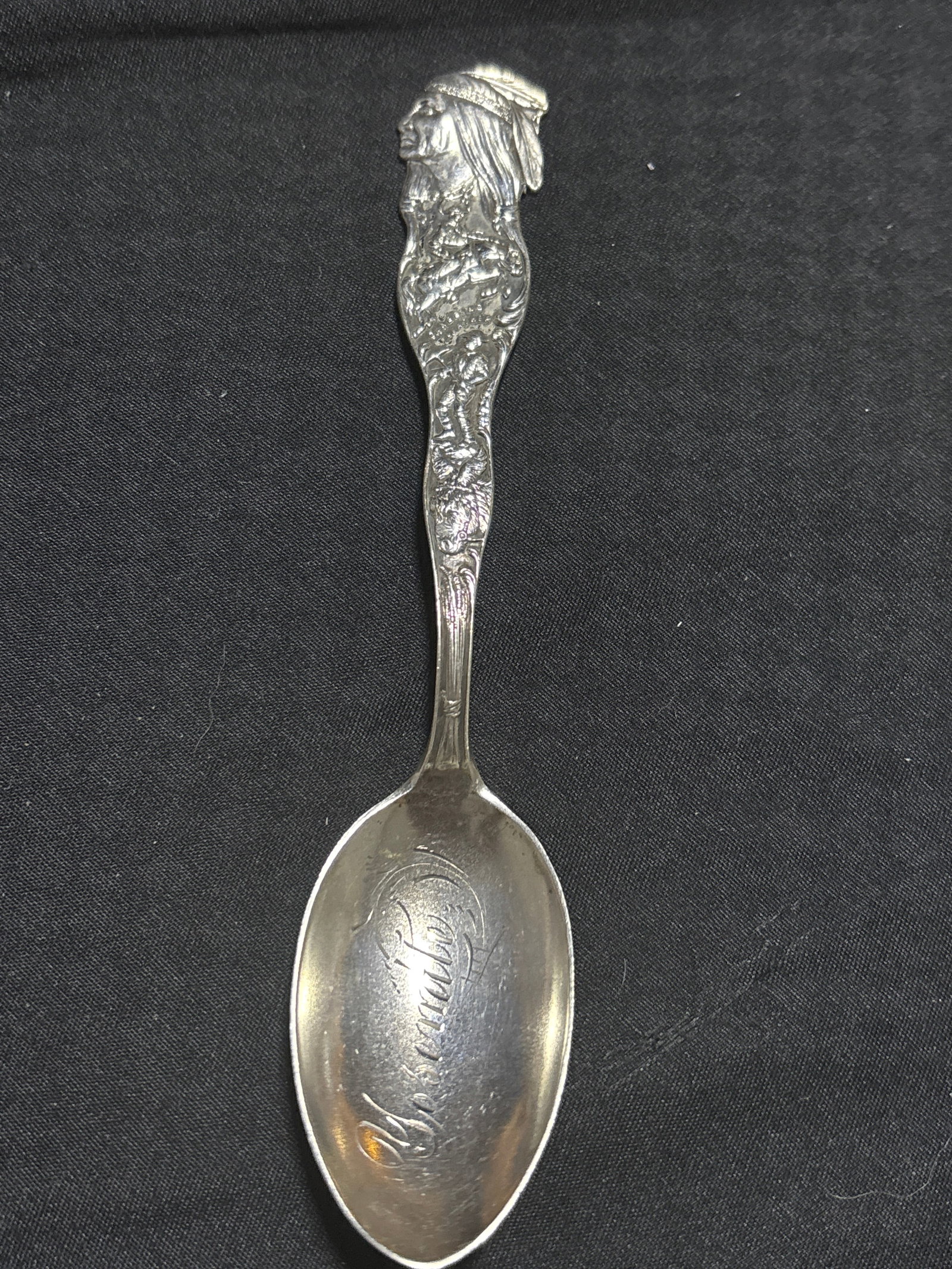 Yellowstone souvenir Native American design 5&7/8inch spoon; 24 grams: Yellowstone souvenir Native American design 5&7/8inch spoon; 24 grams.No pitting, breaks, etc. but light tarnish.