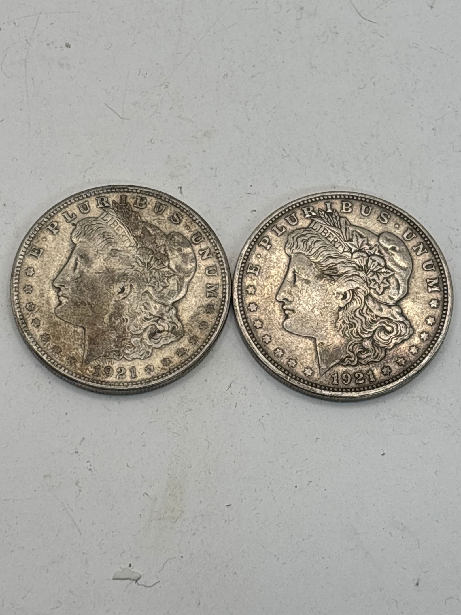 Two original 1921 silver Morgan dollar coins (1 of 6)