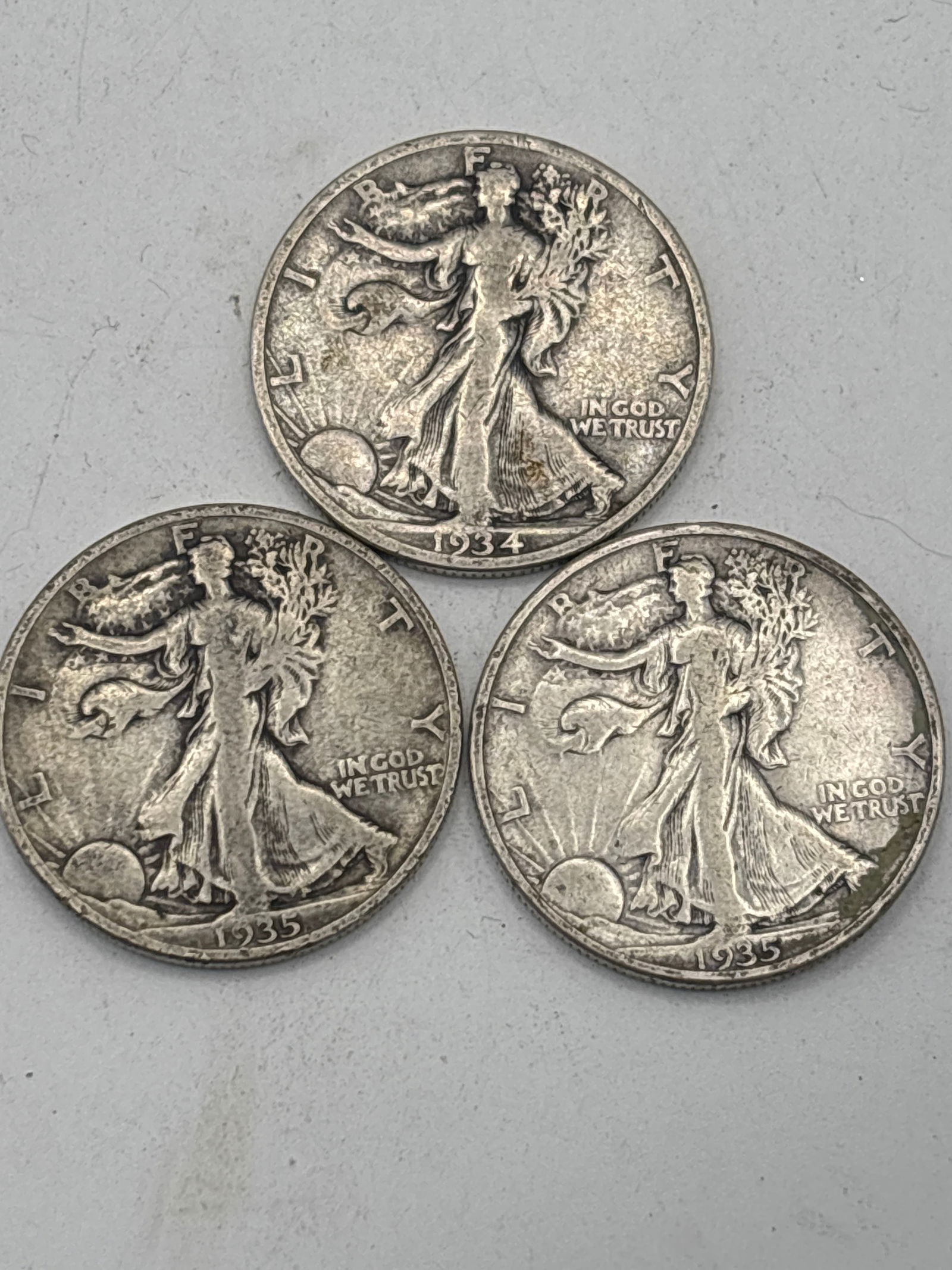 Three pre WWI Walking Liberty silver half dollar coins; 1934 & two 1935 (1 of 7)
