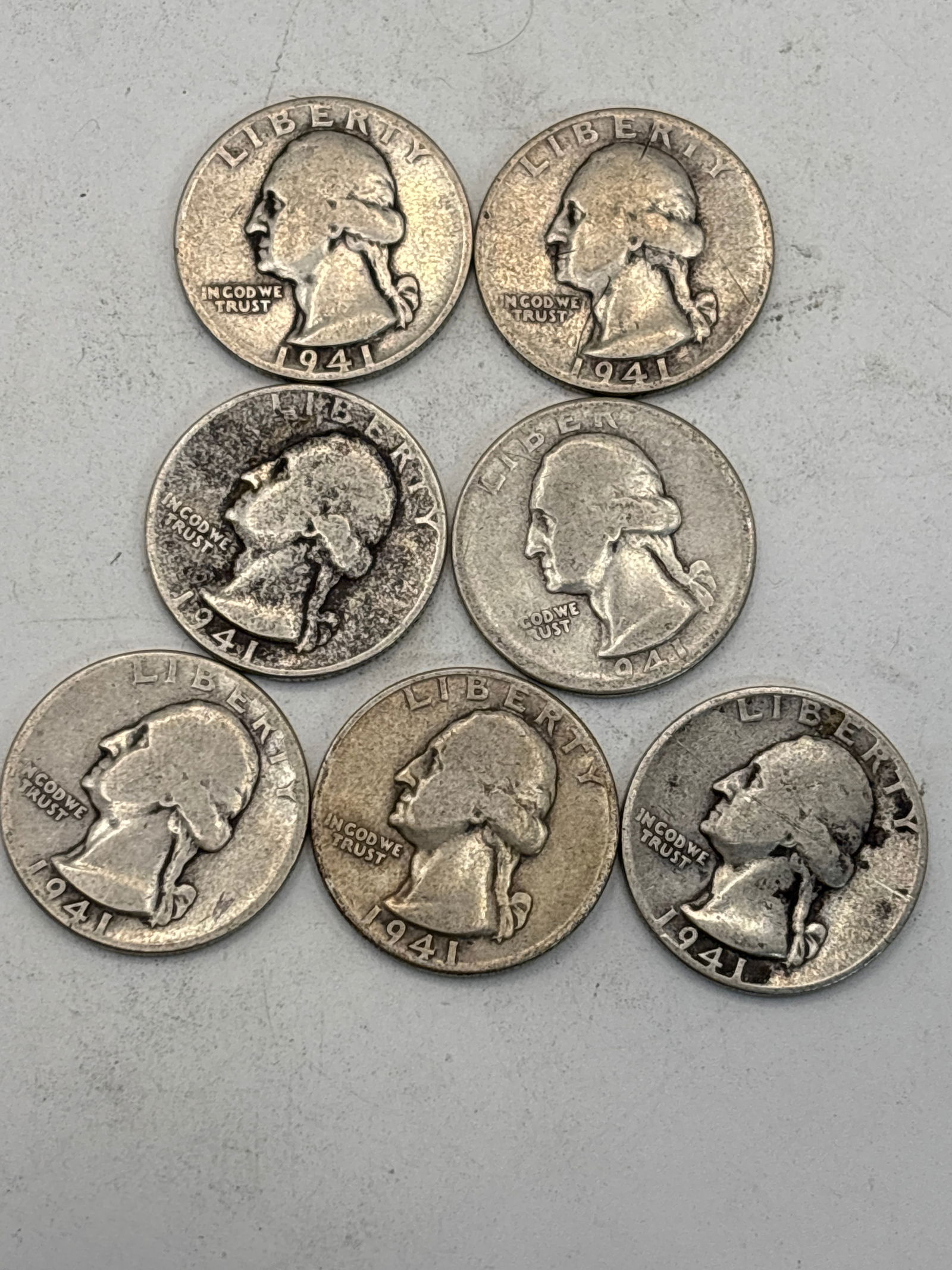 Seven WWII era dated 1941 Washington silver quarters. Worn (1 of 5)