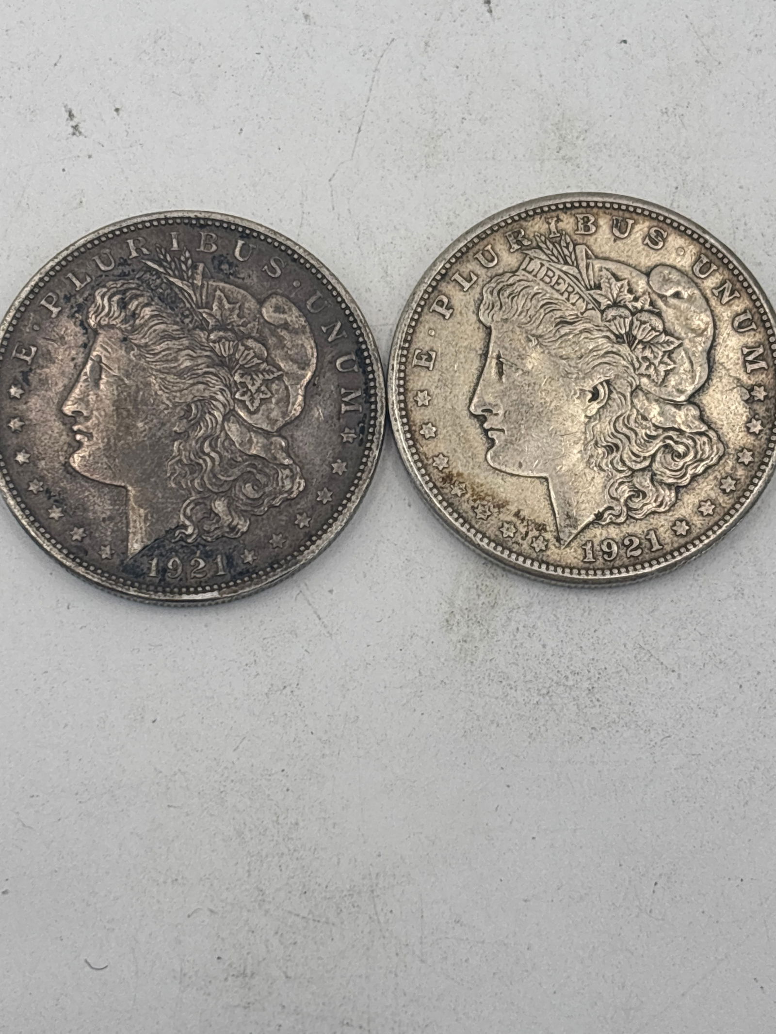 Two 1921 Morgan American silver dollars (1 of 5)