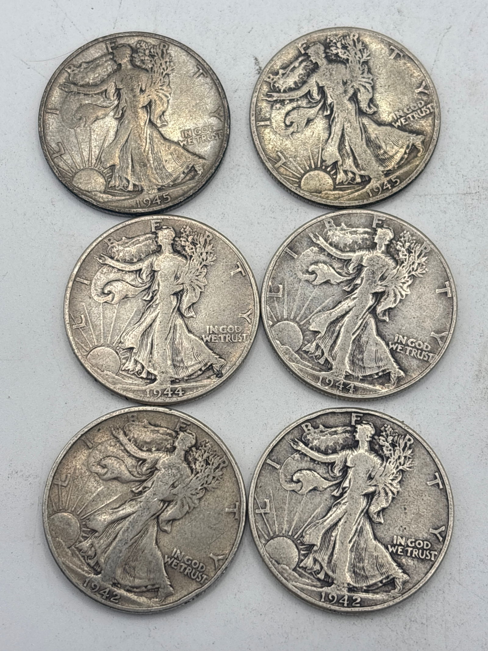 Six WWII era Walking Liberty 1940’s American silver half dollars (1 of 5)
