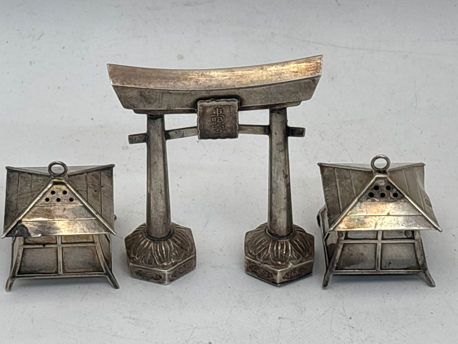 Three piece Japan .950 Sterling pagoda form shakers; 68 grams (1 of 6)