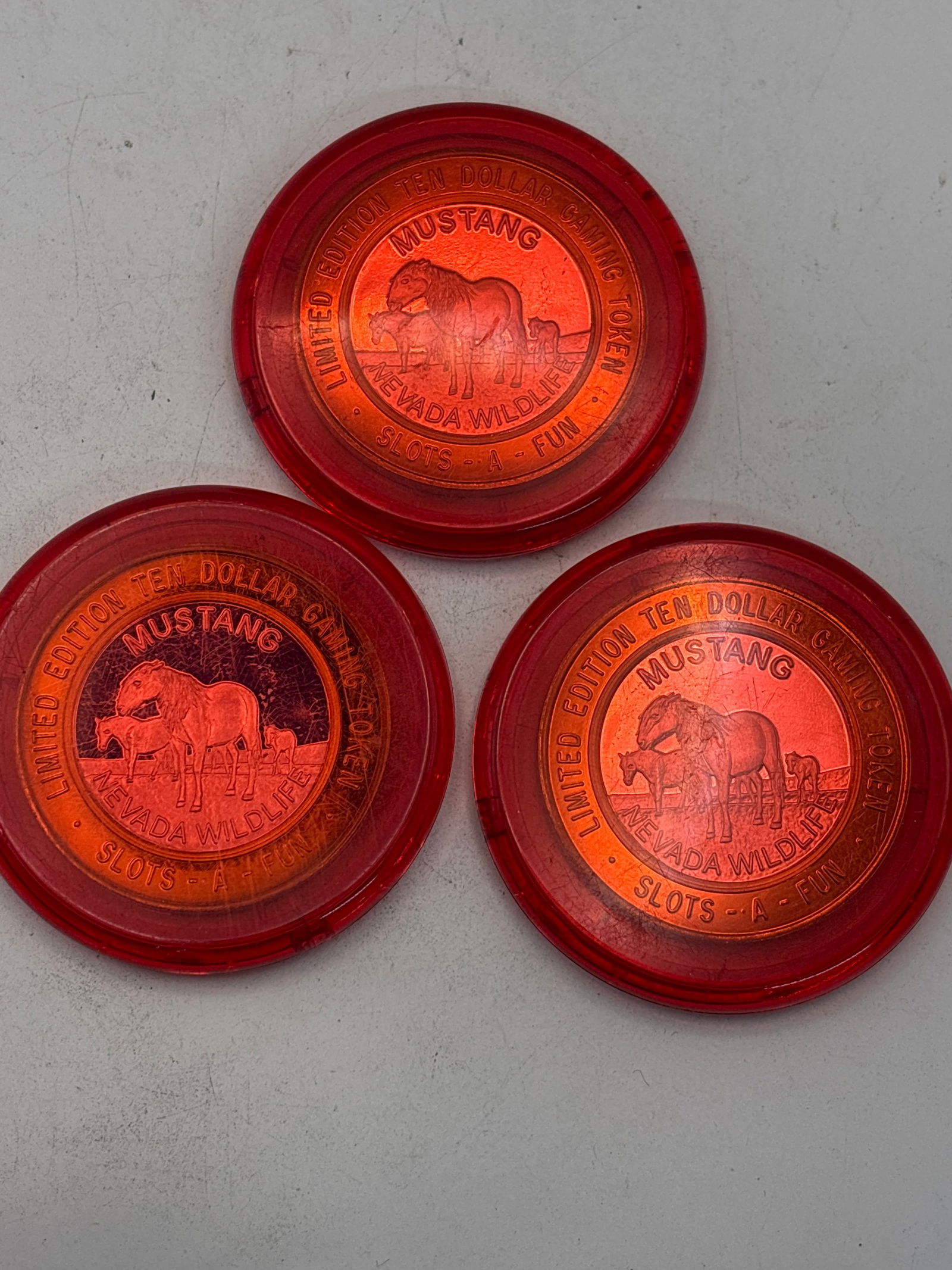 Three encapsulated .999 fine silver $10 gaming token coins (1 of 7)