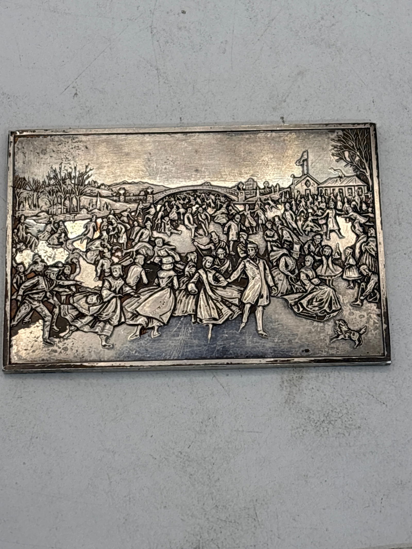 .999 fine silver Currier & Ives Central Park ‘Skating Pond’ bar ; 88 grams: .999 fine silver Currier & Ives Central Park ‘Skating Pond’ bar ; 88 grams. It is 3&1/8 x 2&1/8 inches with relief skating scene. Tarnished.