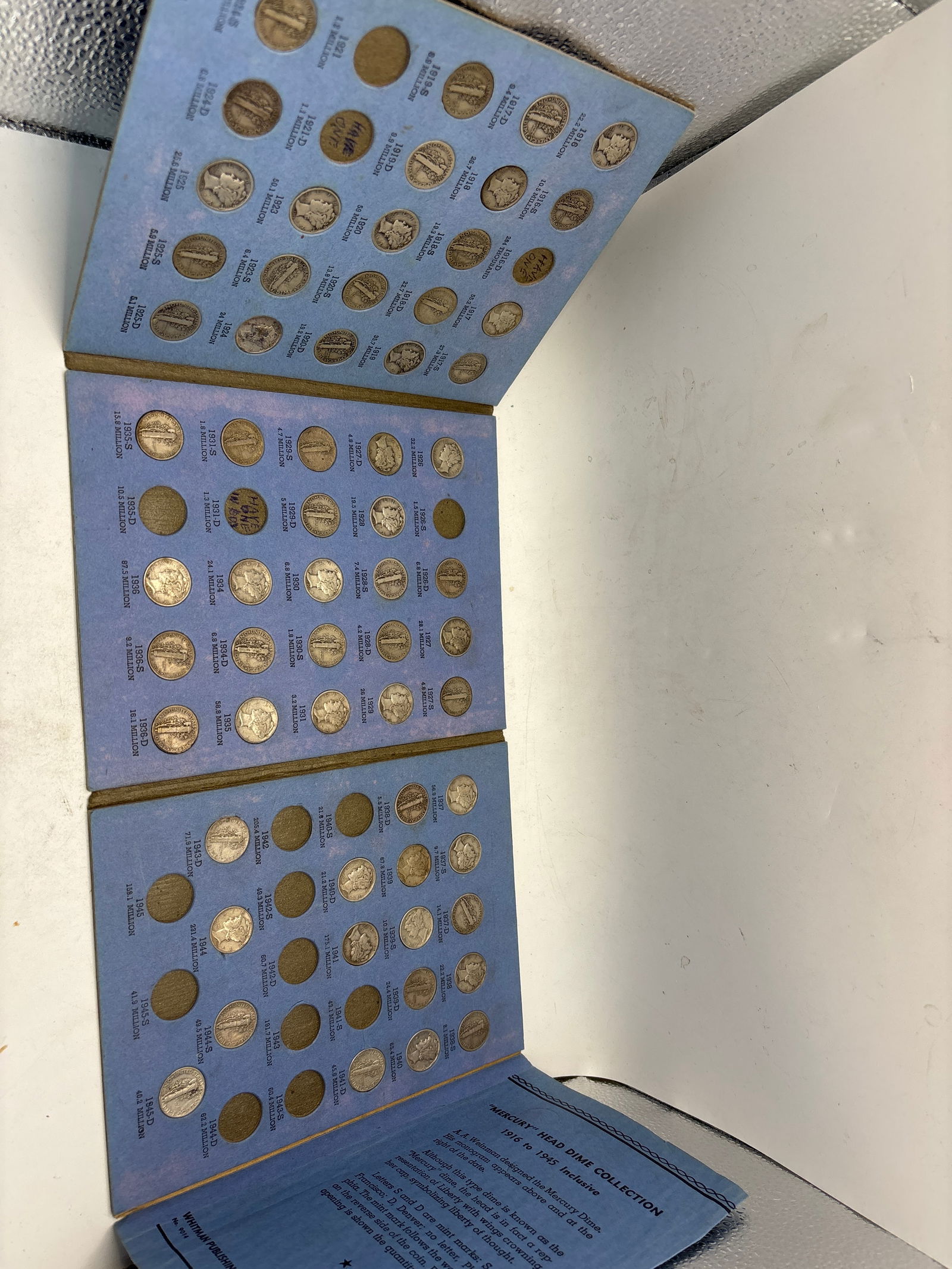 Incomplete Whitman book of Early Mercury silver dimes; 61 coins (1 of 5)
