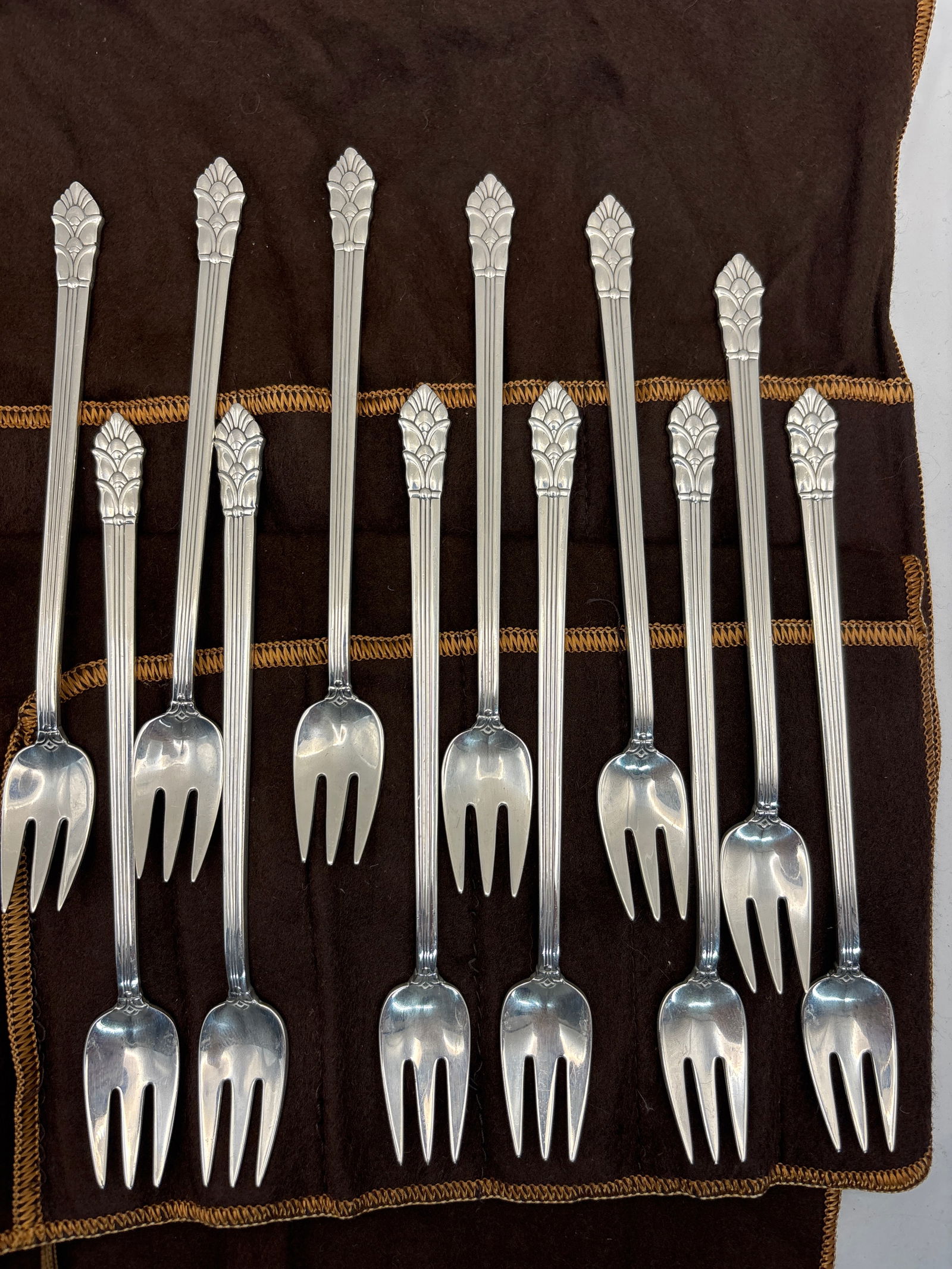 Set of twelve Tiffany & Co. "Palmette" sterling silver 6 inch cocktail forks; 288 grams (1 of 8)