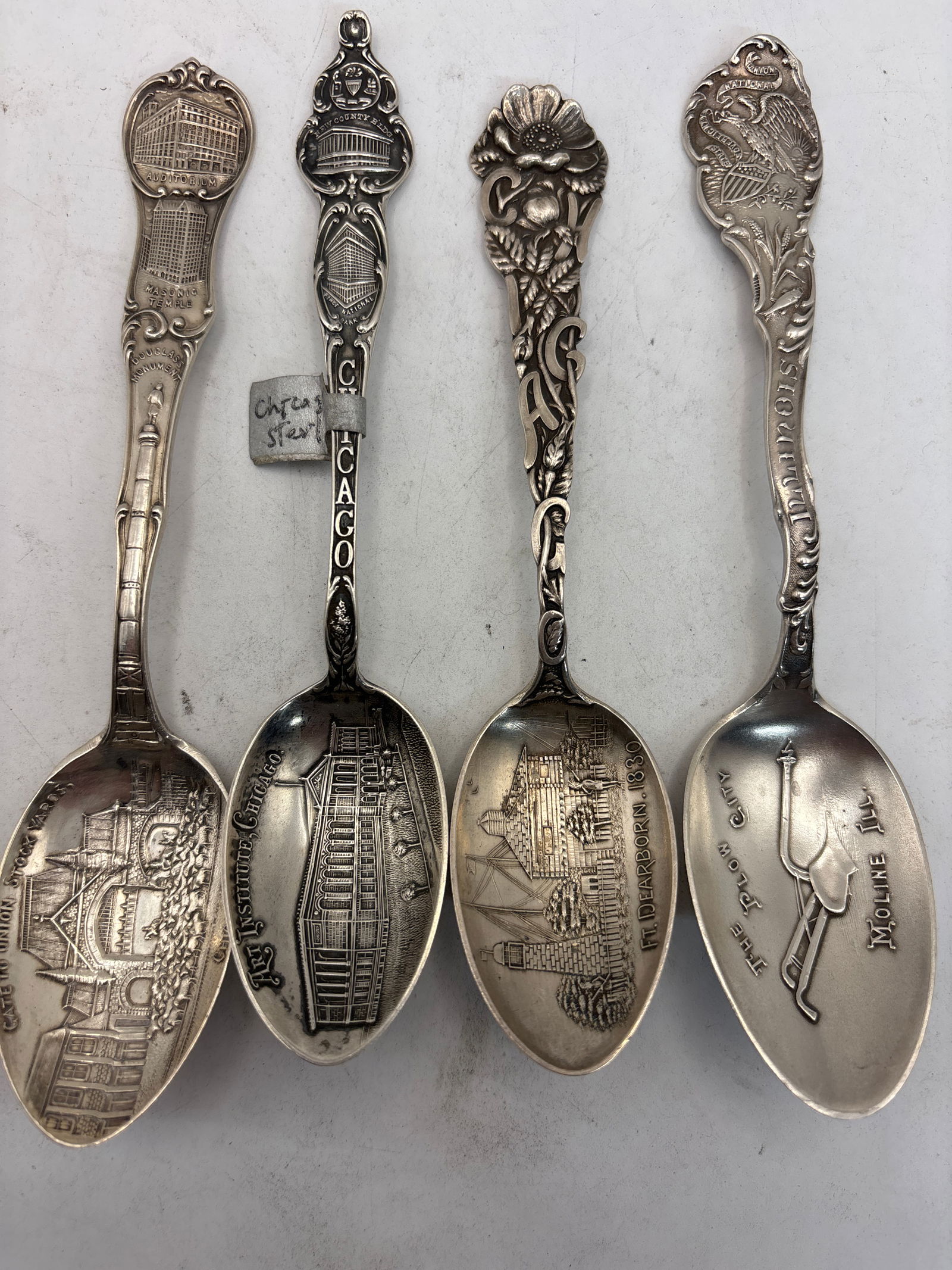 Four Chicago/Illinois sterling silver 5&1/2 inch souvenir spoons; 73 grams: Four Chicago/Illinois sterling silver 5&1/2 inch souvenir spoons; 73 grams. Three Chicago & a Moline, Ill. One. Good condition