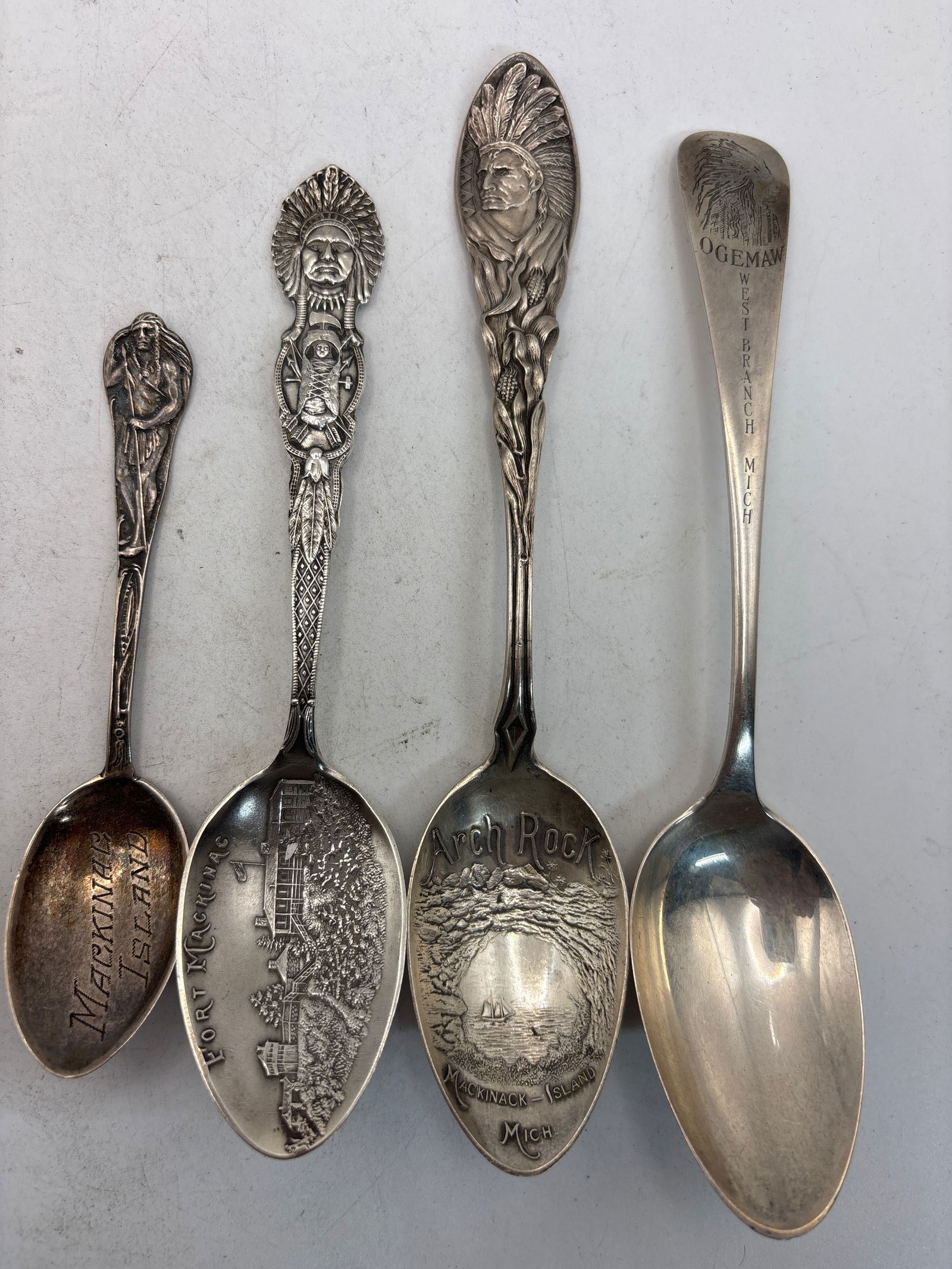 Four Native Indian design Mich. sterling silver souvenir spoons; 71 grams (1 of 7)