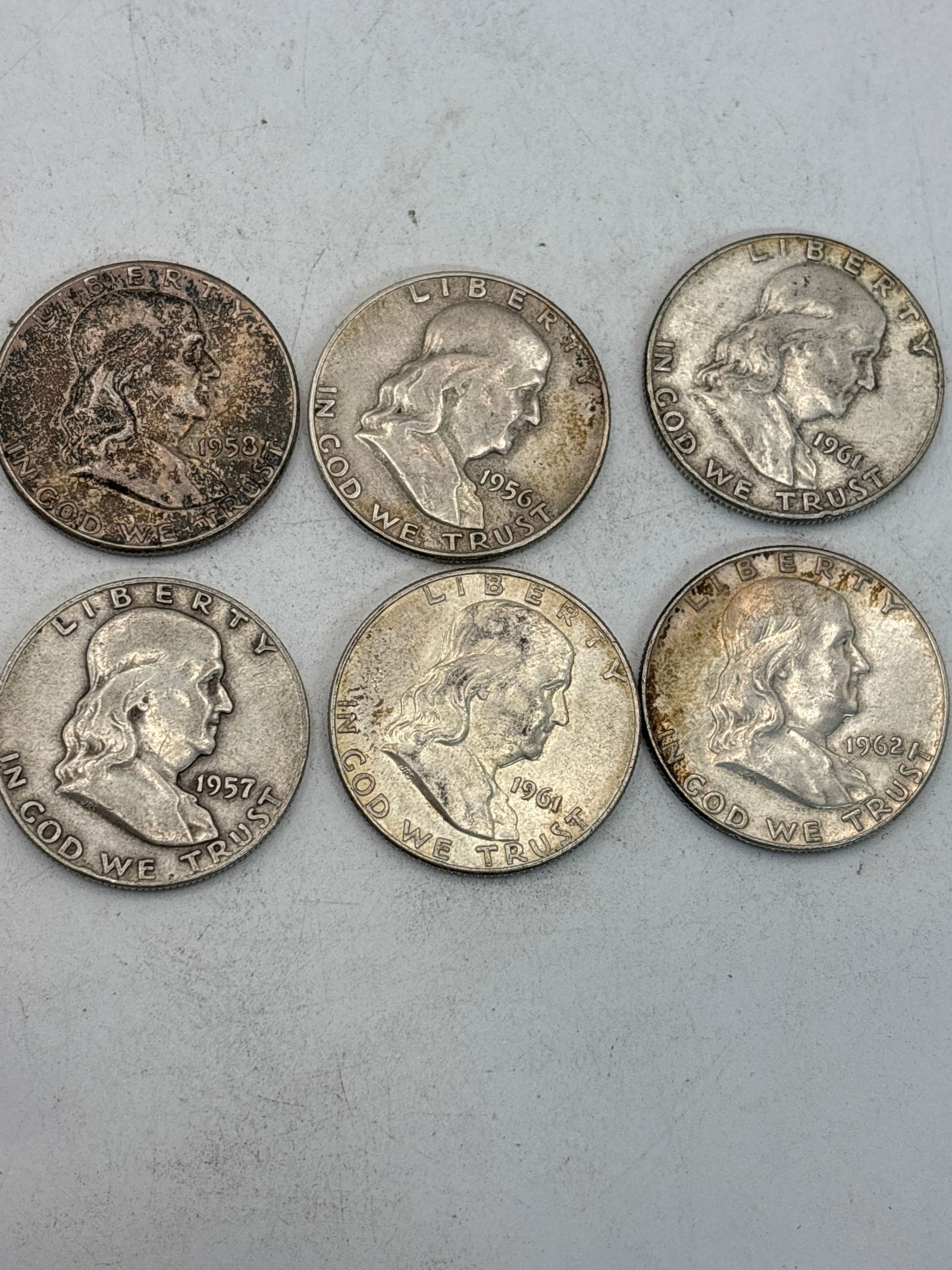 Six assorted Benjamin Franklin silver half dollars (.50) (1 of 7)