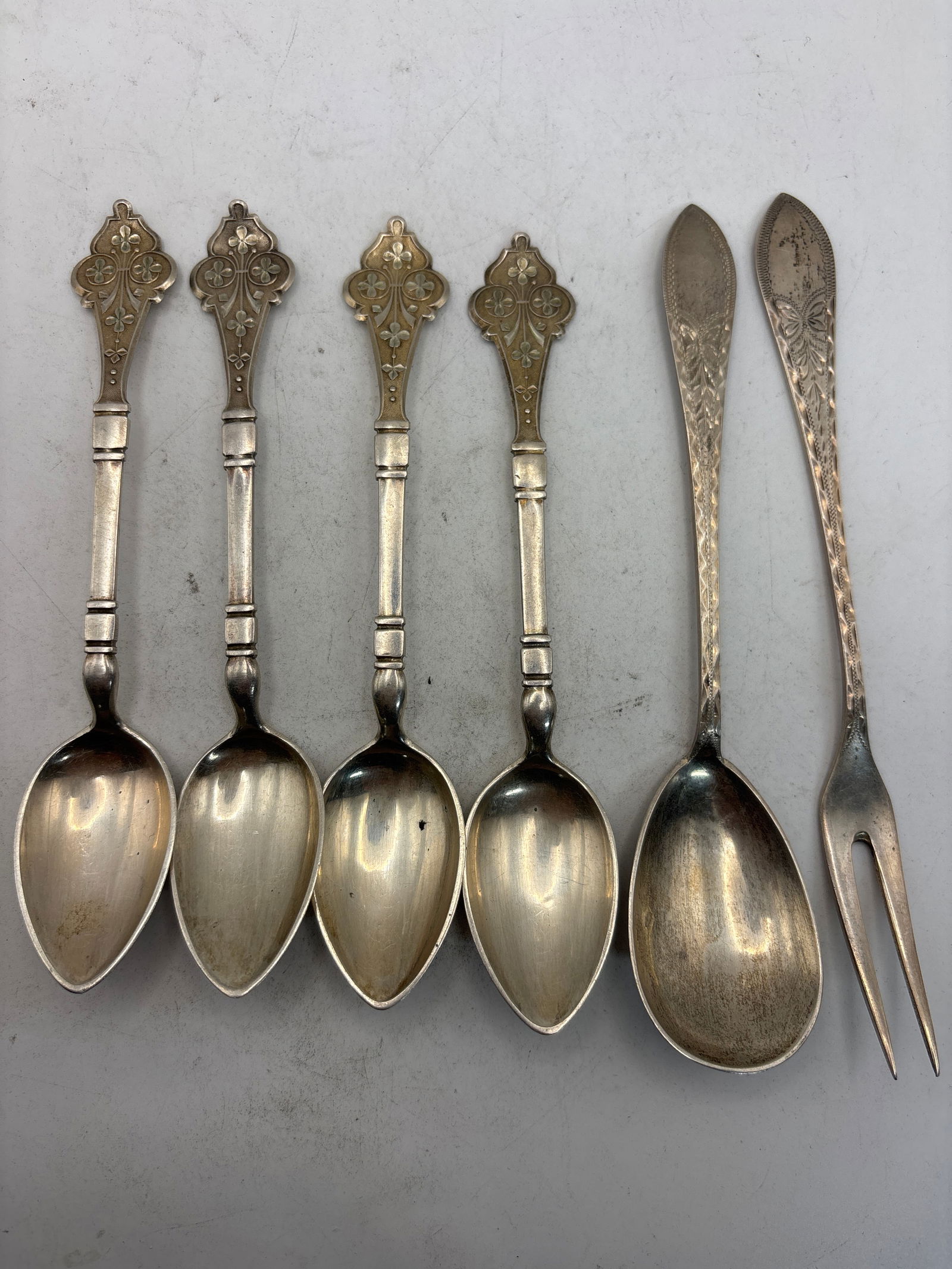 Six Europe .830 silver spoons & fork; 69 grams: Six Europe .830 silver spoons & cocktail fork; 69 grams