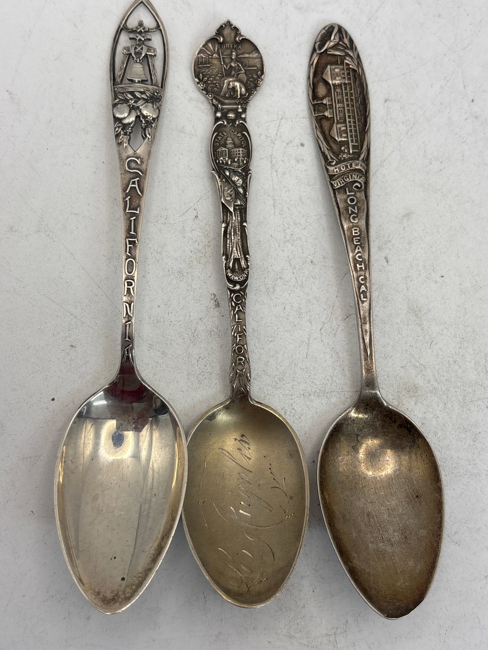 Three California Sterling silver 5&1/2 inch souvenir spoons; 50 grams: Three California Sterling silver 5&1/2 inch souvenir spoons; 50 grams. good condition