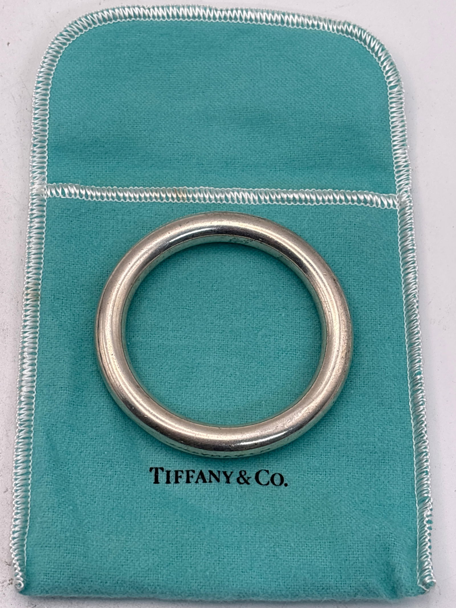 Vintage Tiffany & Co. sterling silver 2&1/2 circular rattle/bracelet; 29 grams (1 of 5)
