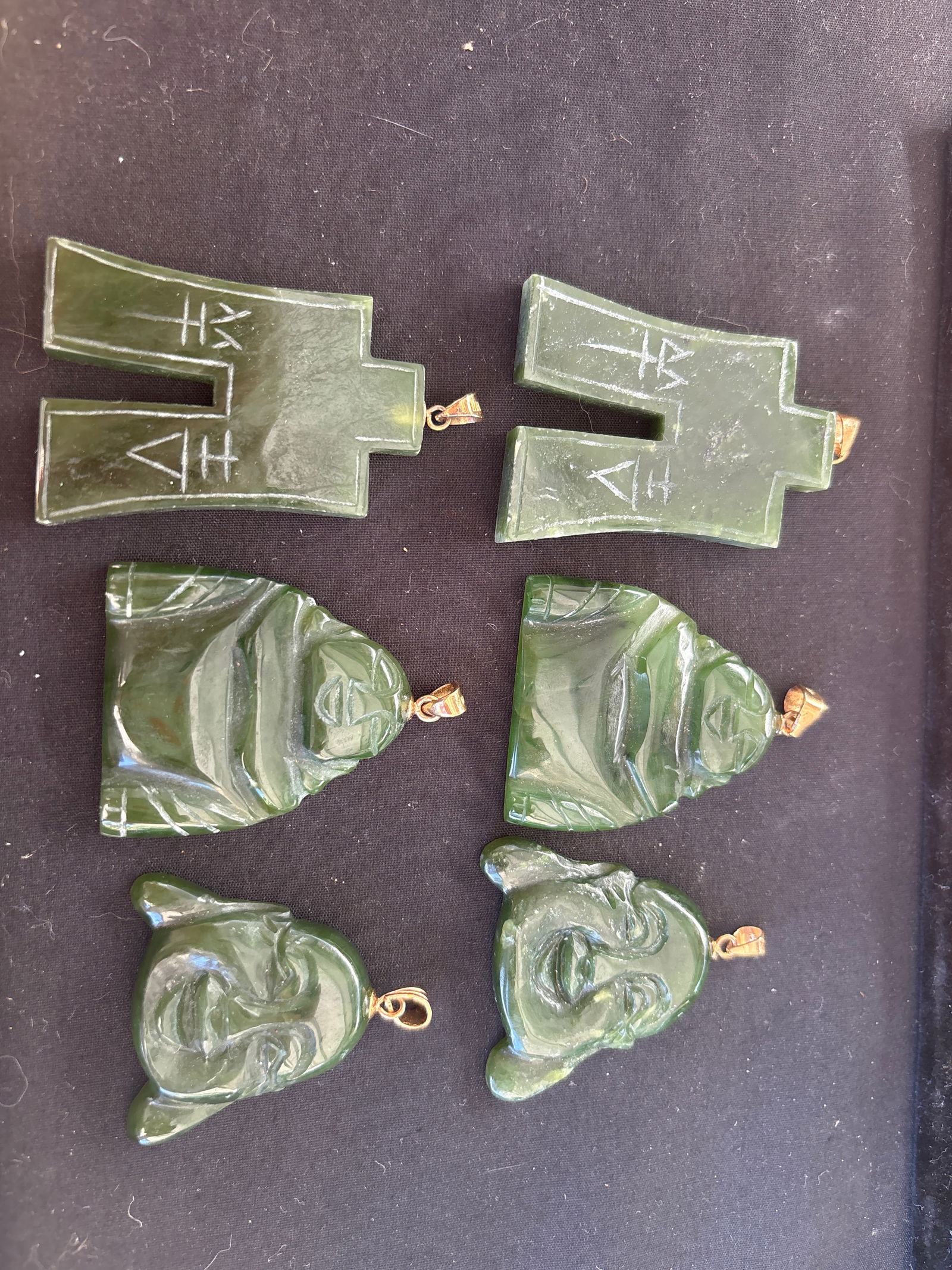 Six assorted jade or jadeite Buddha, etc form hand carved pendants (1 of 7)