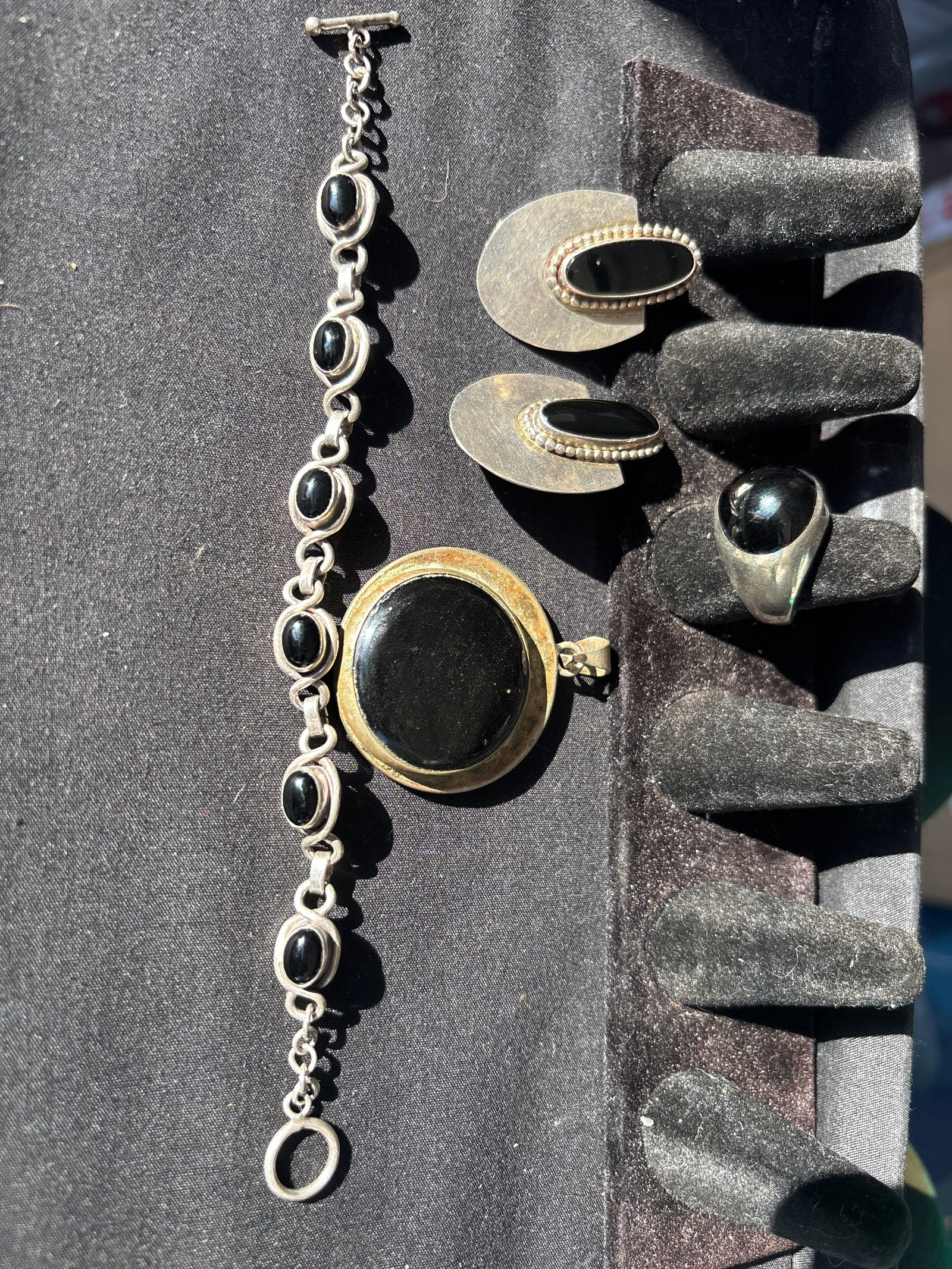Five pieces jet black inset ring, earrings, pendant & a bracelet; 74 grams: Five pieces jet black inset ring, earrings, pendant & a bracelet; 74 grams.. Ring is 8&1/2-9, braclet About 7 inches.